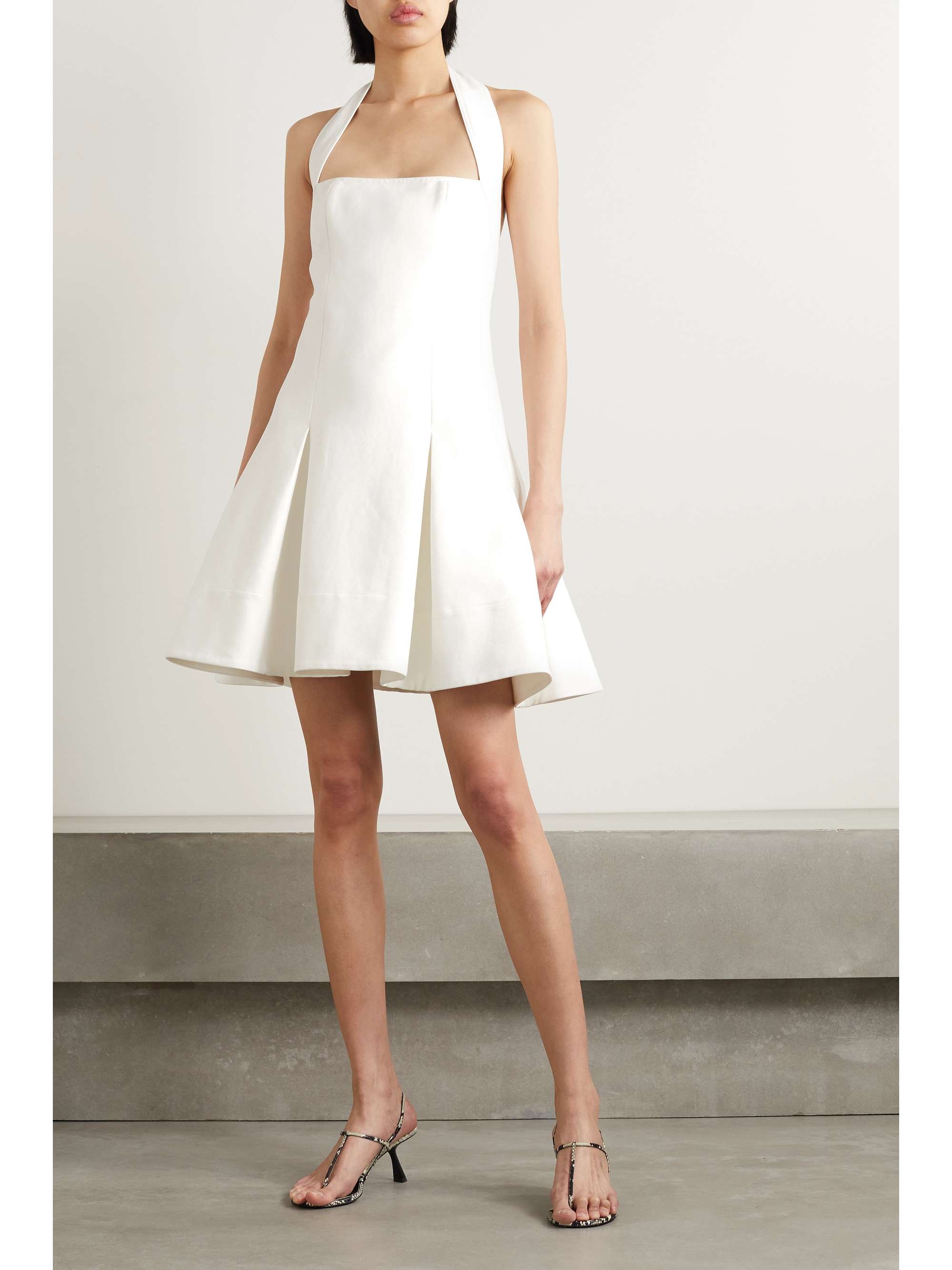 KHAITE Hila pleated twill halterneck mini dress