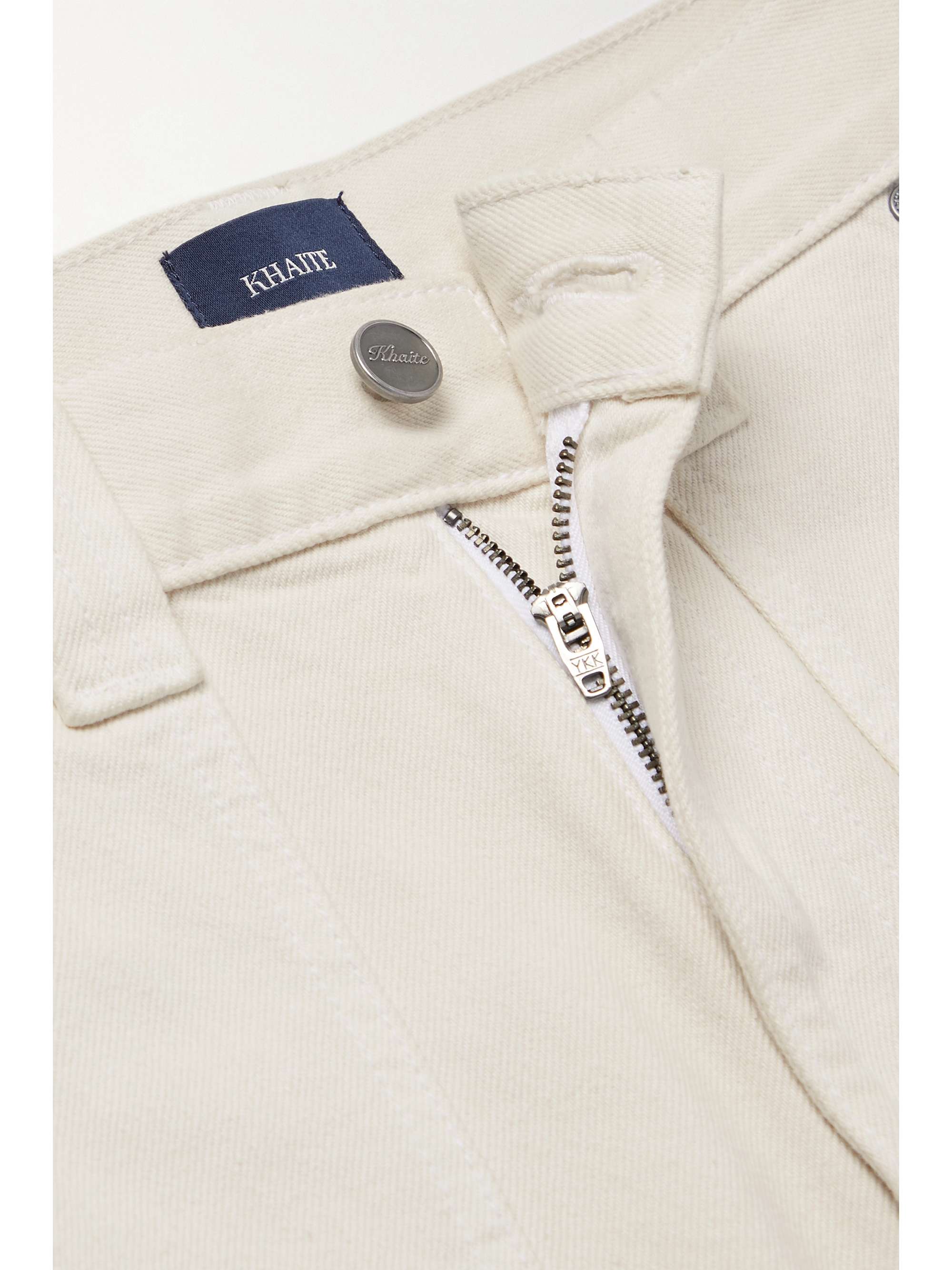 KHAITE Hewey cropped high-rise tapered jeans