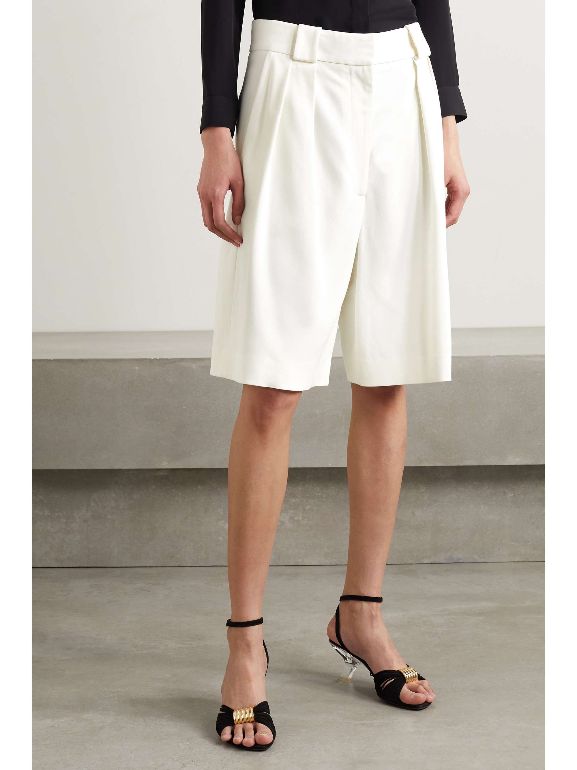 KHAITE Rillo pleated twill shorts