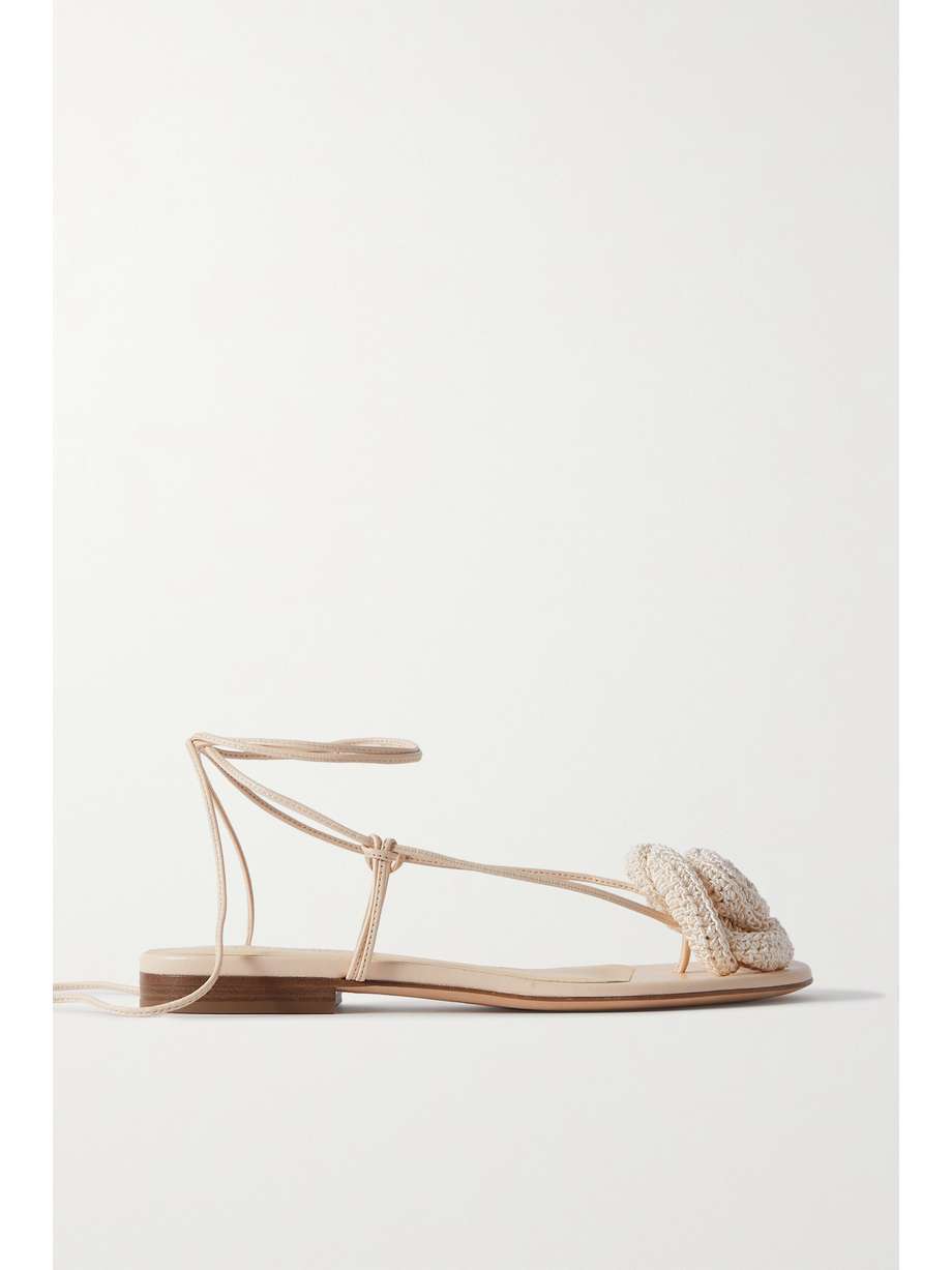 The fashion world has fallen for Magda Butrym's signature three-dimensional blooms. These flat sandals are topped with a detachable crocheted flower inspired by vintage shoe clips and have strappy leather ties. They’re the perfect excuse for a rosy pedicure.