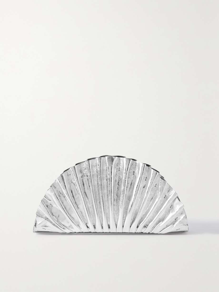 It's the elaborate silhouettes of Cult Gaia's accessories that make them so unique - pieces like this 'Nala' clutch are defined by the brand as "wearable art." Made from metallic leather, it has a ruched, fan-like shape with just enough space inside for evening essentials like your phone, keys and cards.