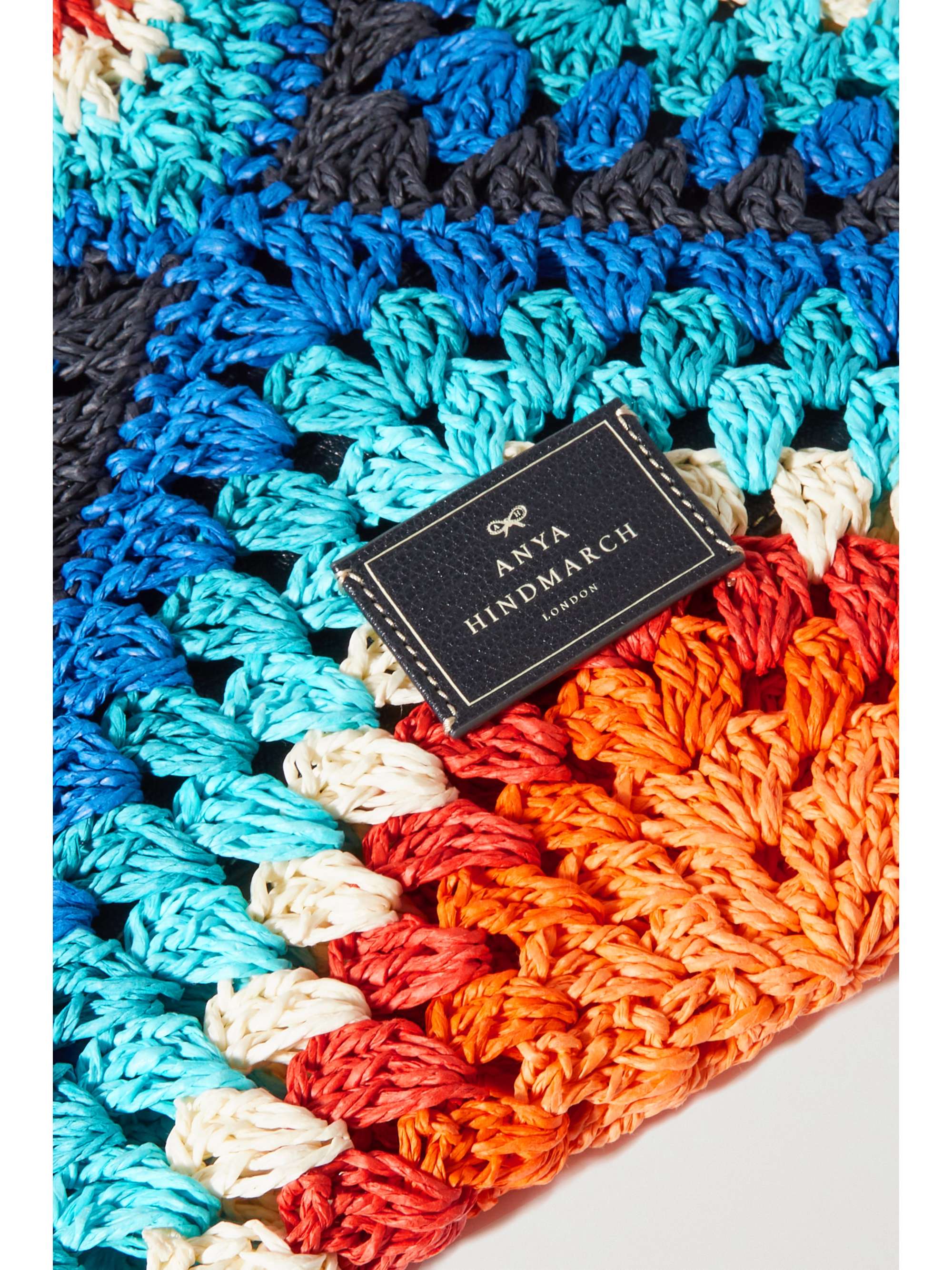 ANYA HINDMARCH Tasseled leather-trimmed crocheted raffia tote