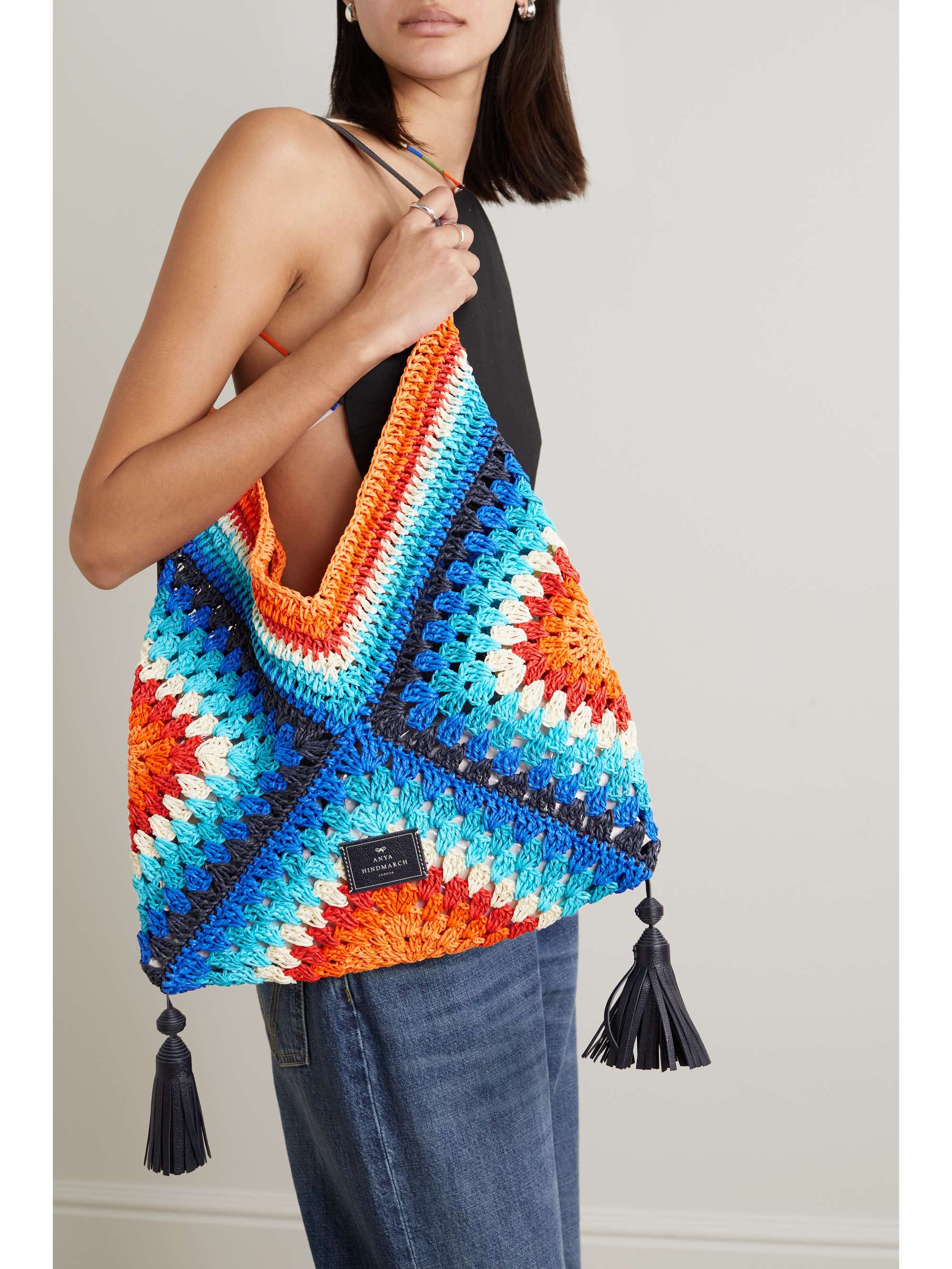 ANYA HINDMARCH Tasseled leather-trimmed crocheted raffia tote