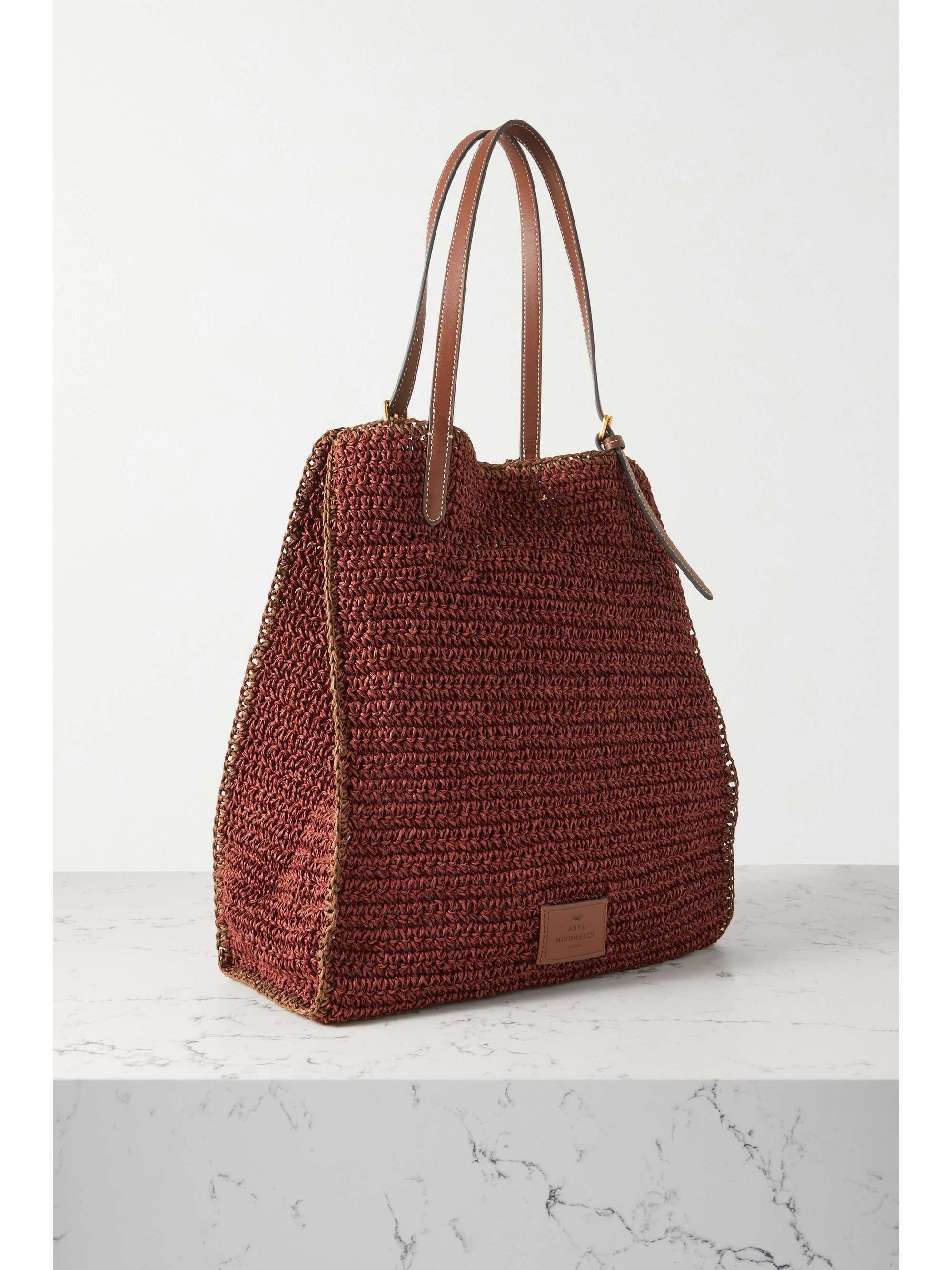 ANYA HINDMARCH Anya Brands Coppertone leathertrimmed striped raffia