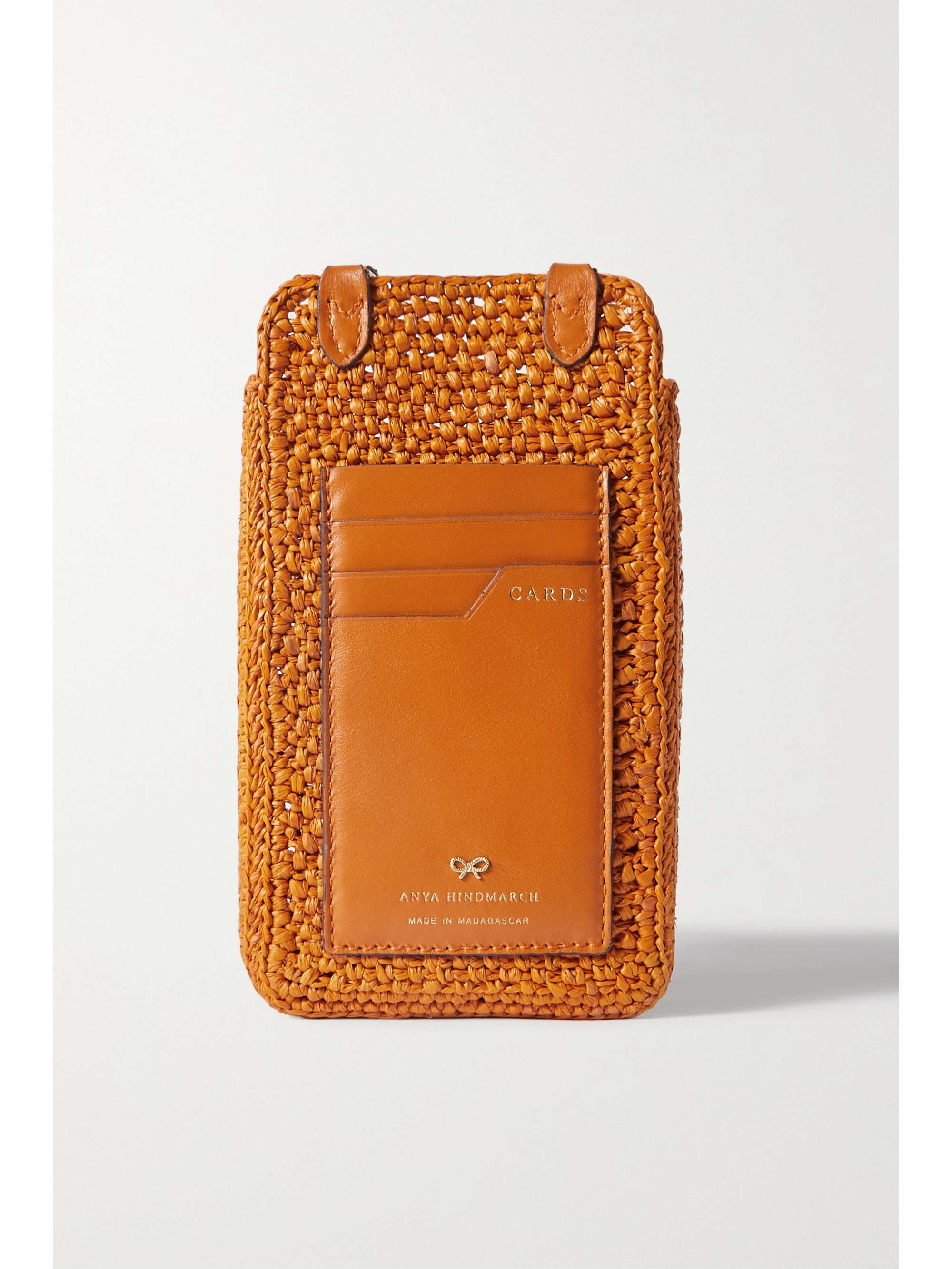 ANYA HINDMARCH Eyes embroidered leathertrimmed raffia phone case NETAPORTER