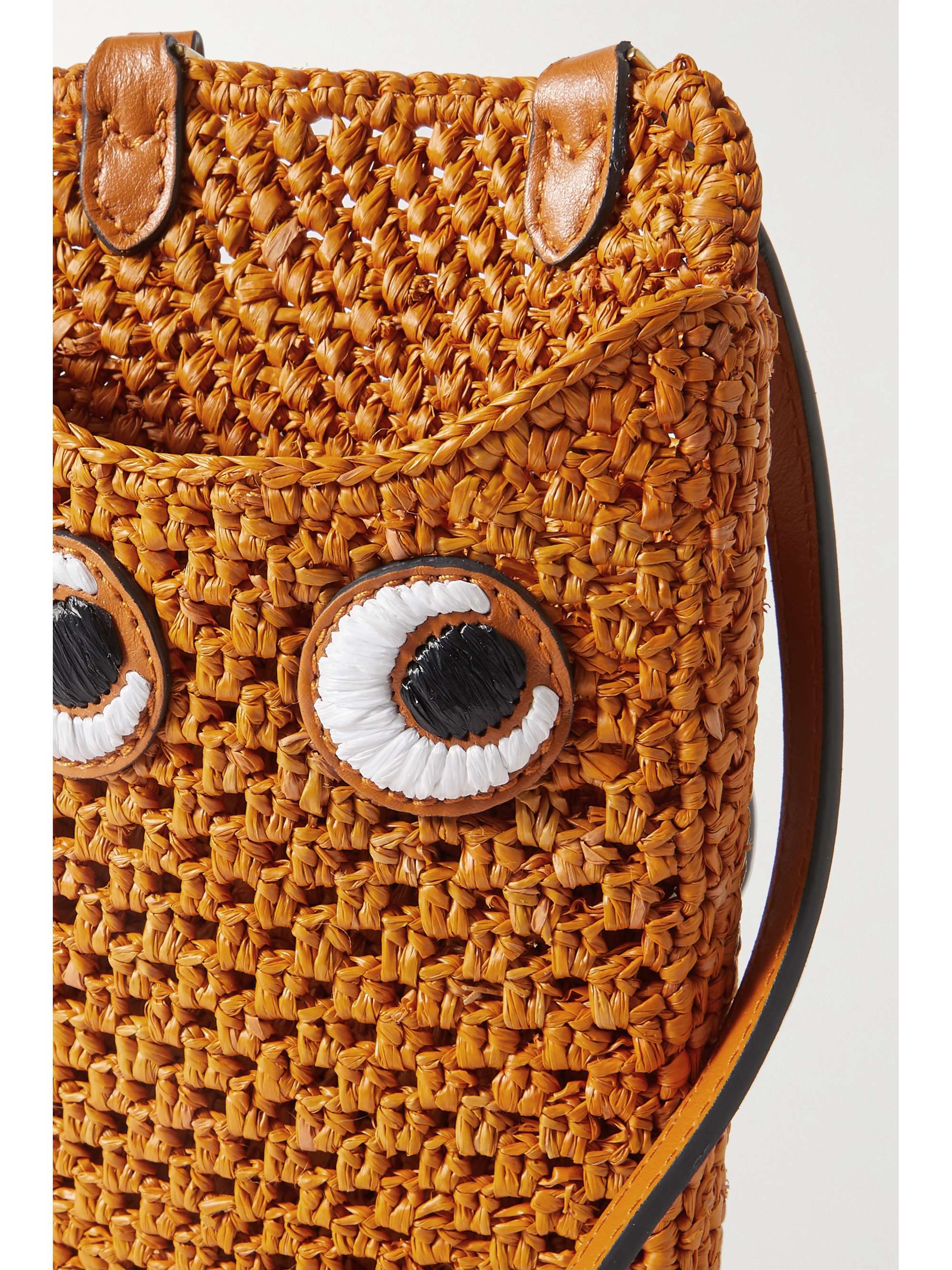 ANYA HINDMARCH Eyes embroidered leathertrimmed raffia phone case NET