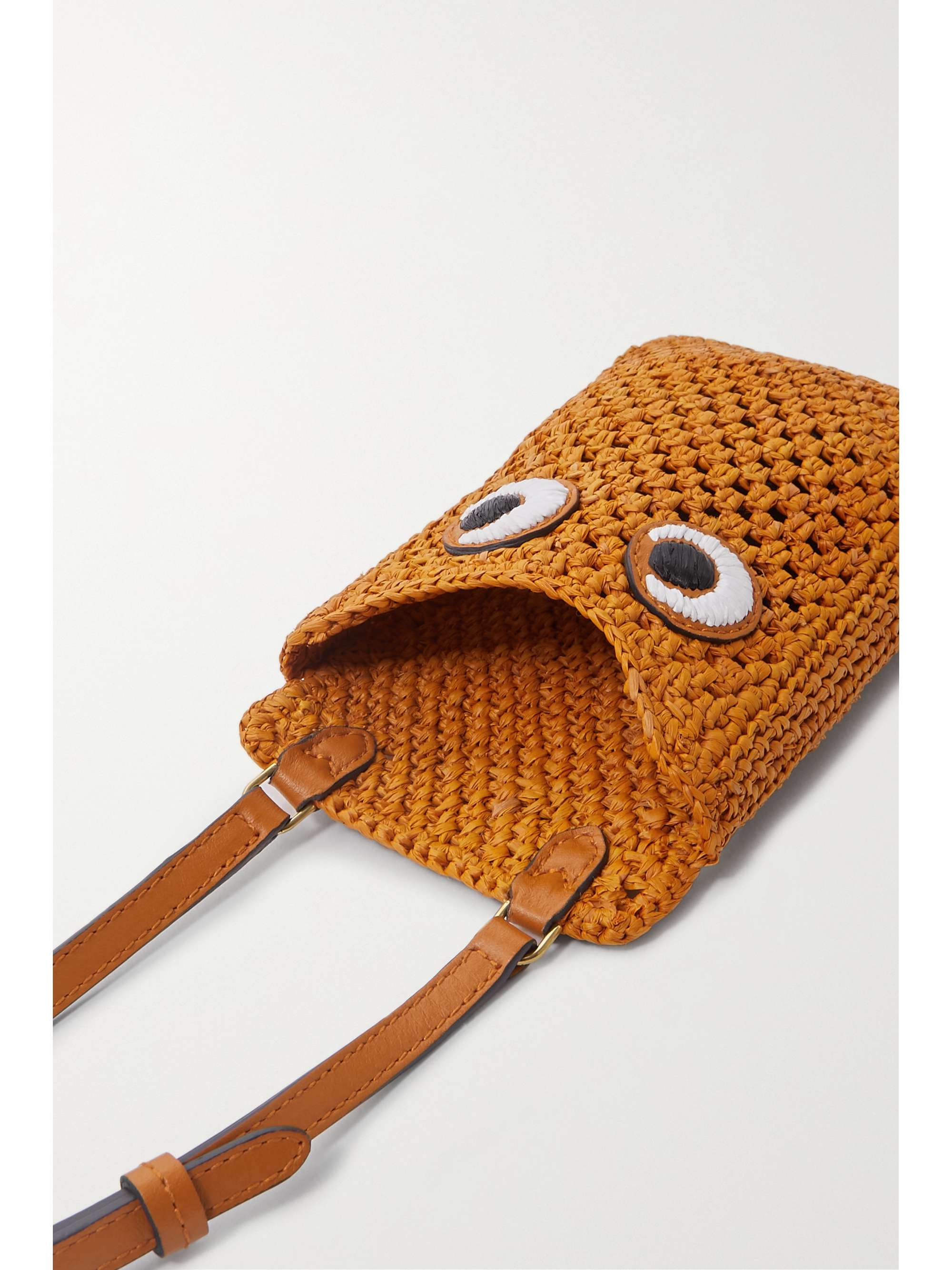 ANYA HINDMARCH Eyes embroidered leathertrimmed raffia phone case NET