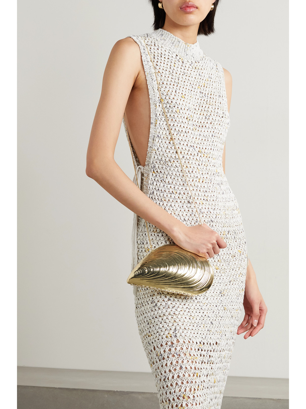 Simkhai Bridget Metal Oyster Shell Clutch In Gold