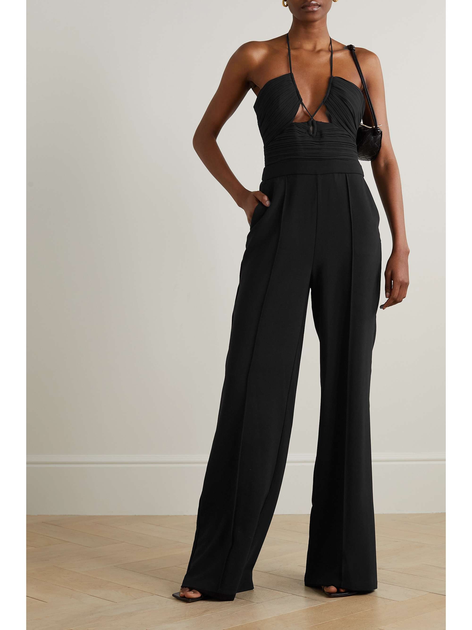 SIMKHAI Gala cutout pleated jersey halterneck jumpsuit | NET-A-PORTER