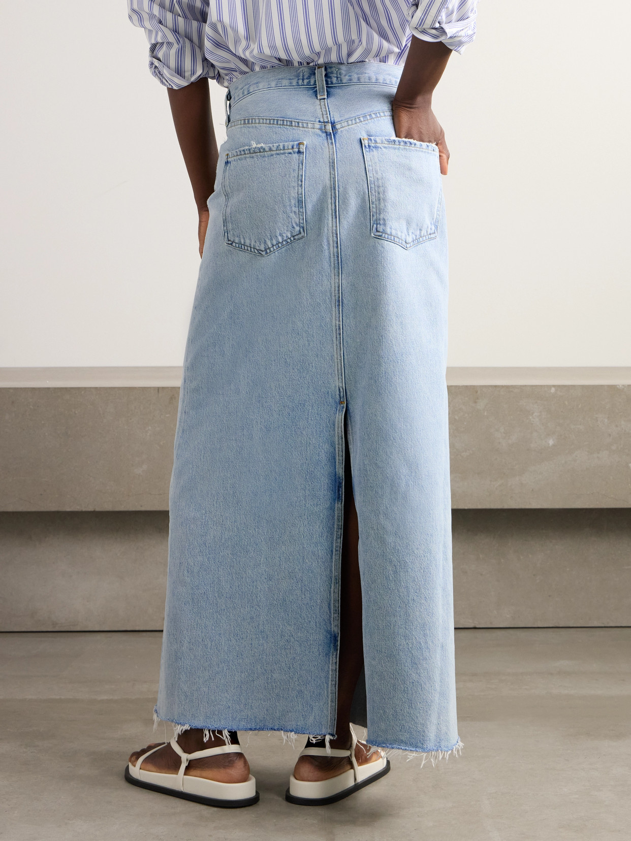 Shop Agolde + Net Sustain Hilla Frayed Organic Denim Maxi Skirt In Blue