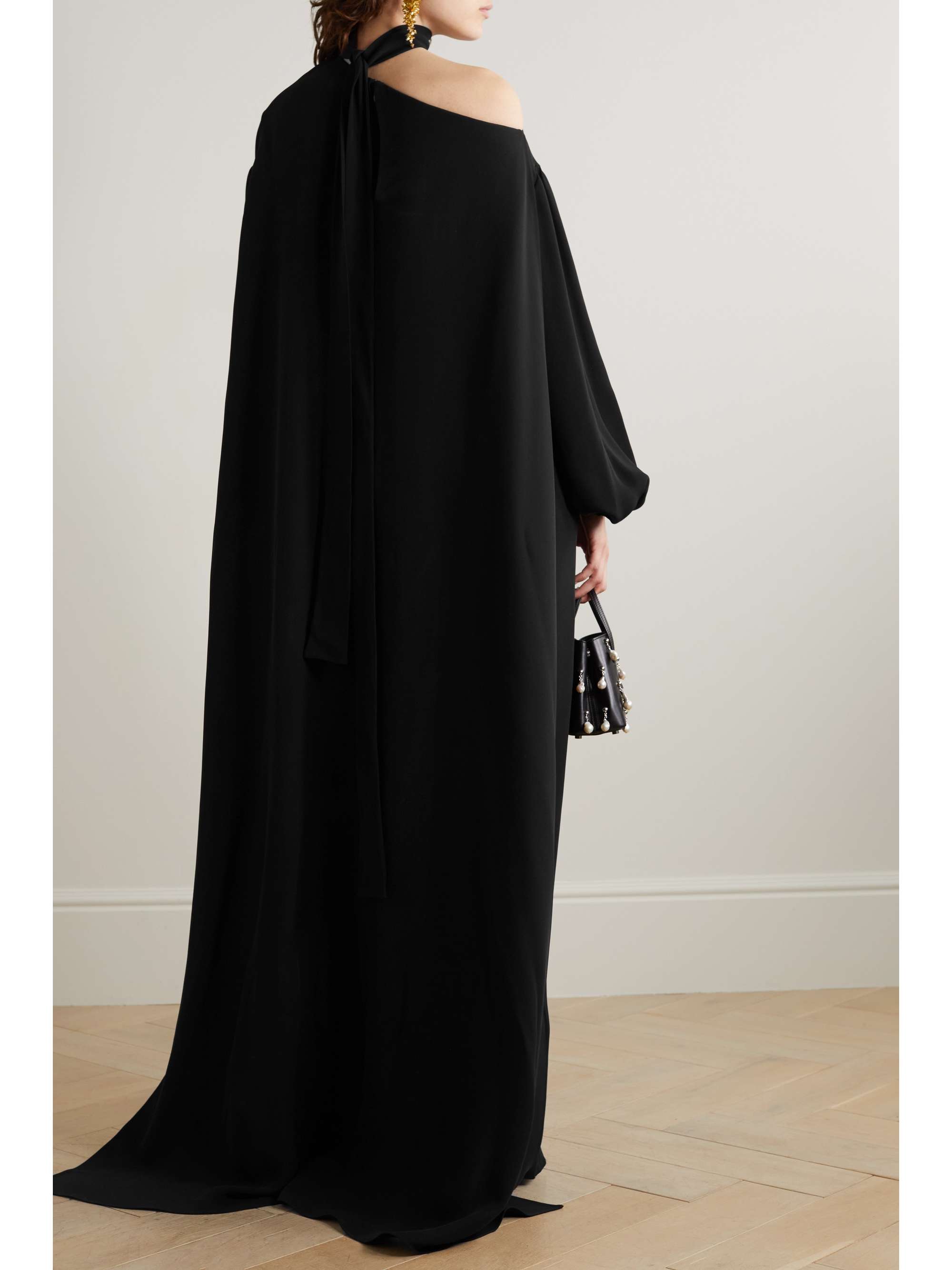 Valentino Solid Jumpsuit in Nero | FWRD