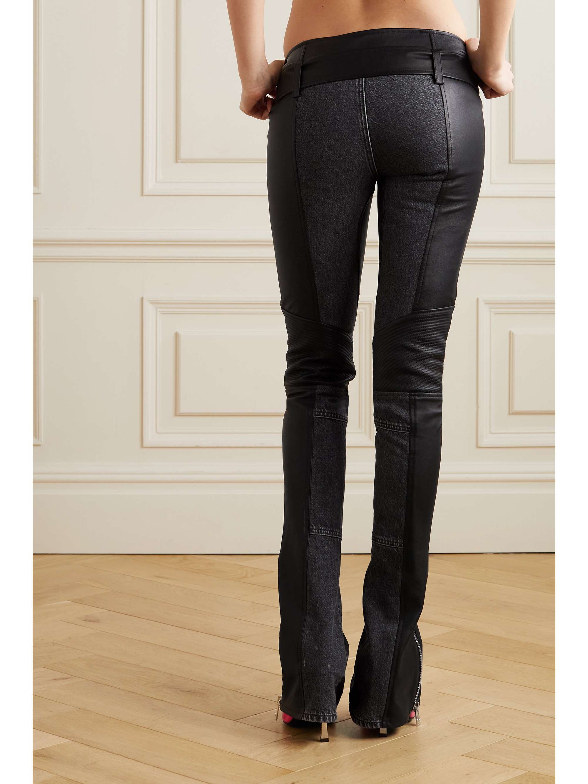 VERSACE Belted leather and denim flared pants