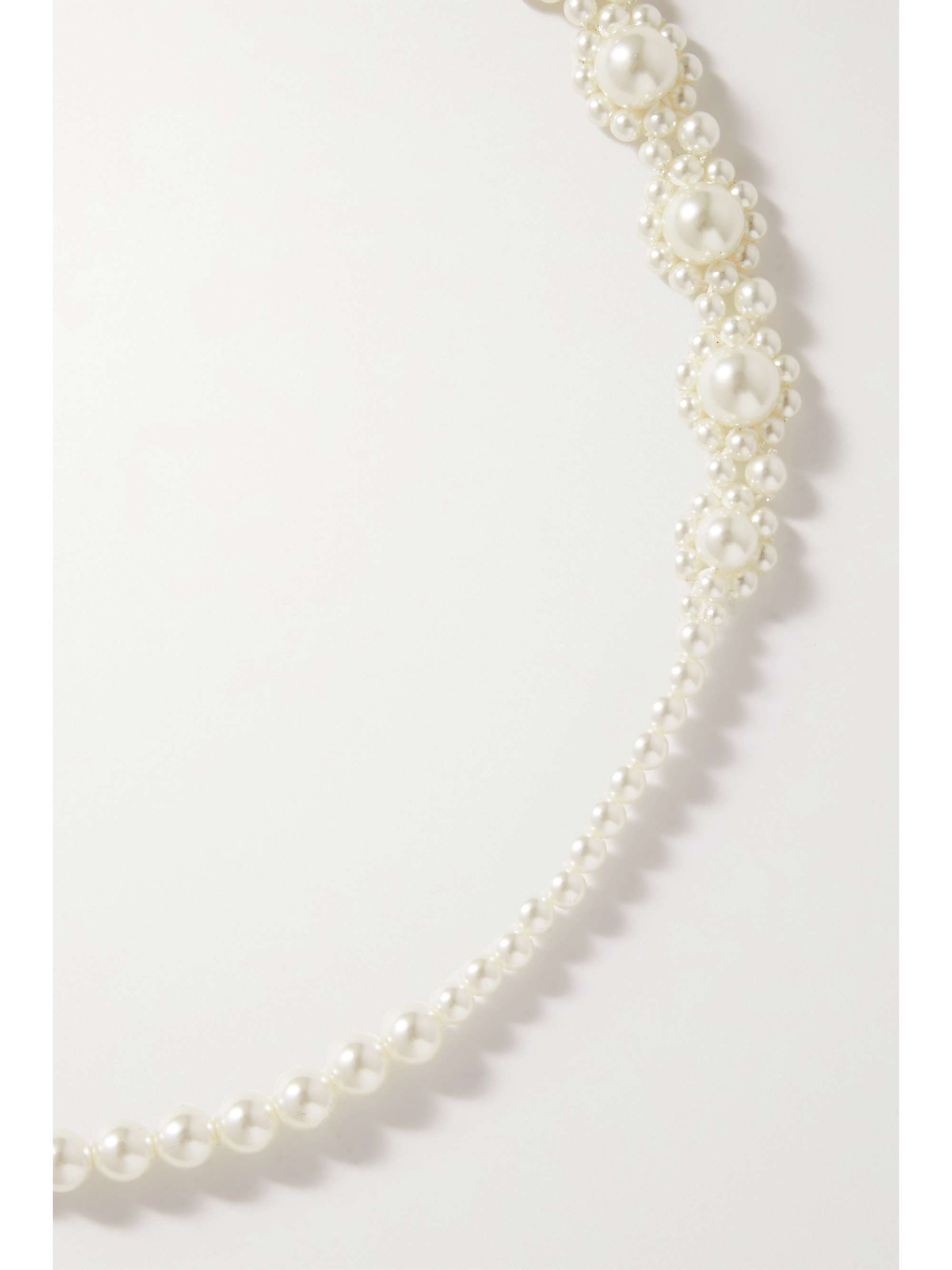 Fake shop pearl necklace