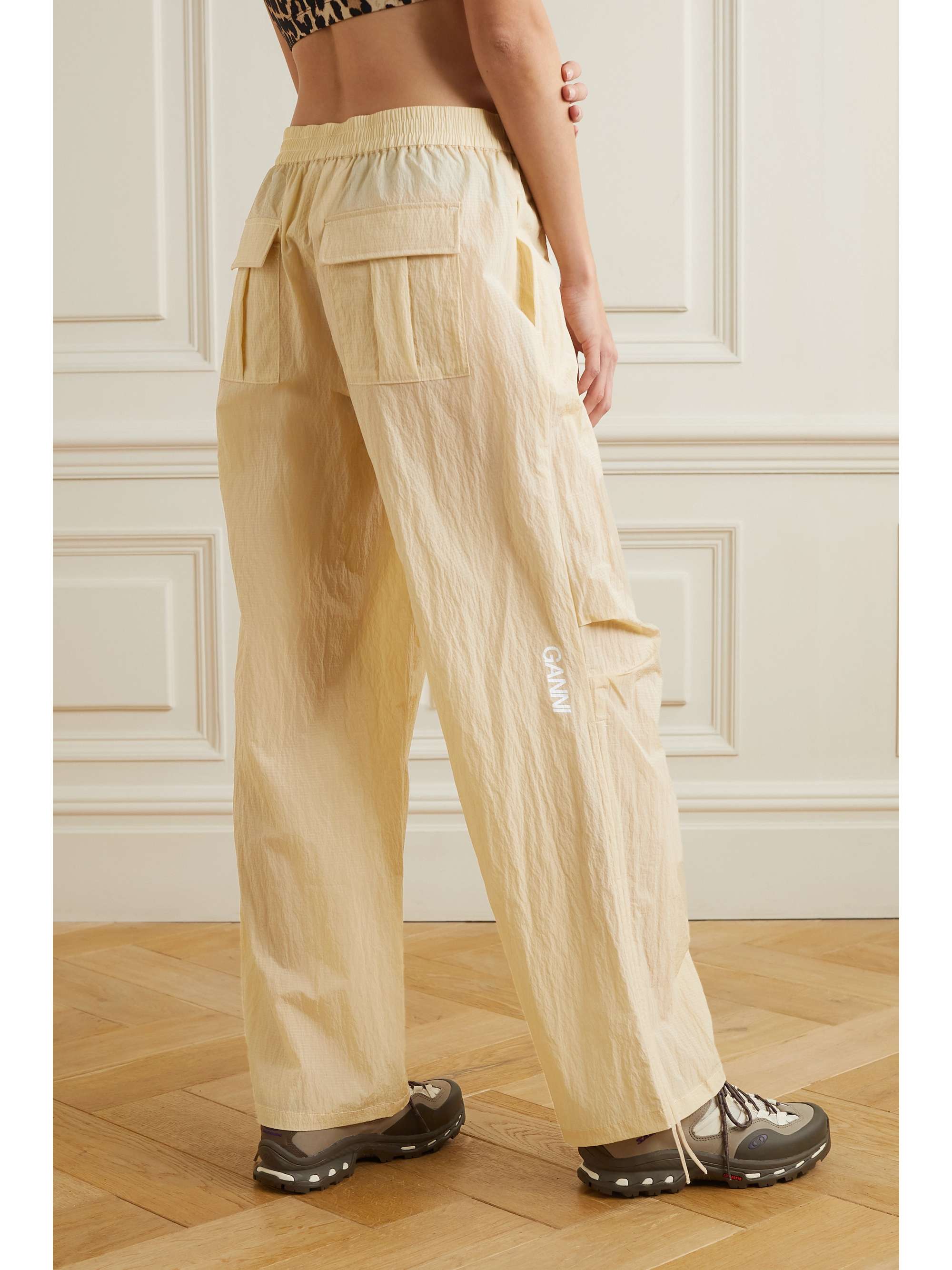 GANNI Appliquéd printed crinkled recycled-shell track pants