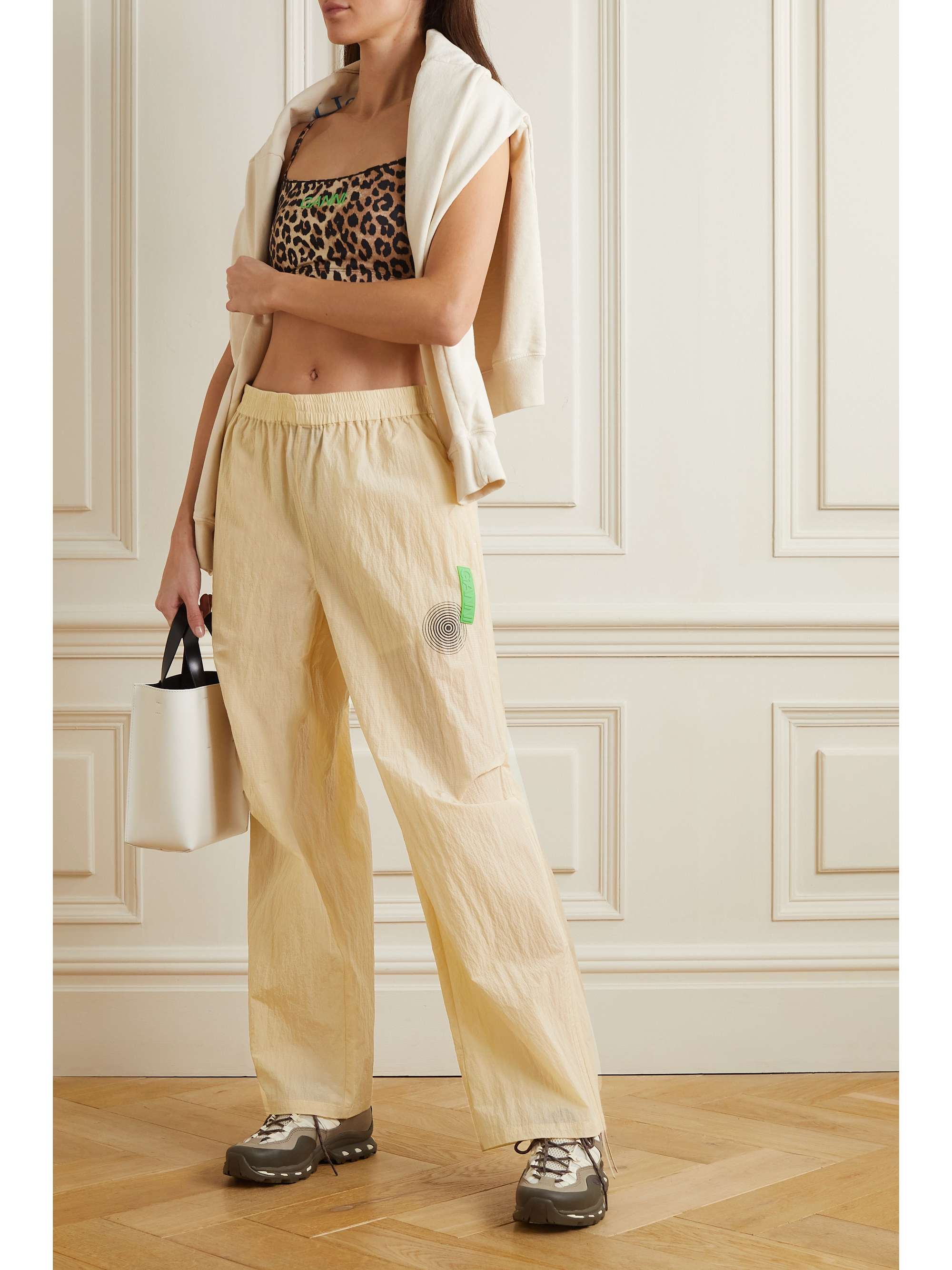 GANNI Appliquéd printed crinkled recycled-shell track pants