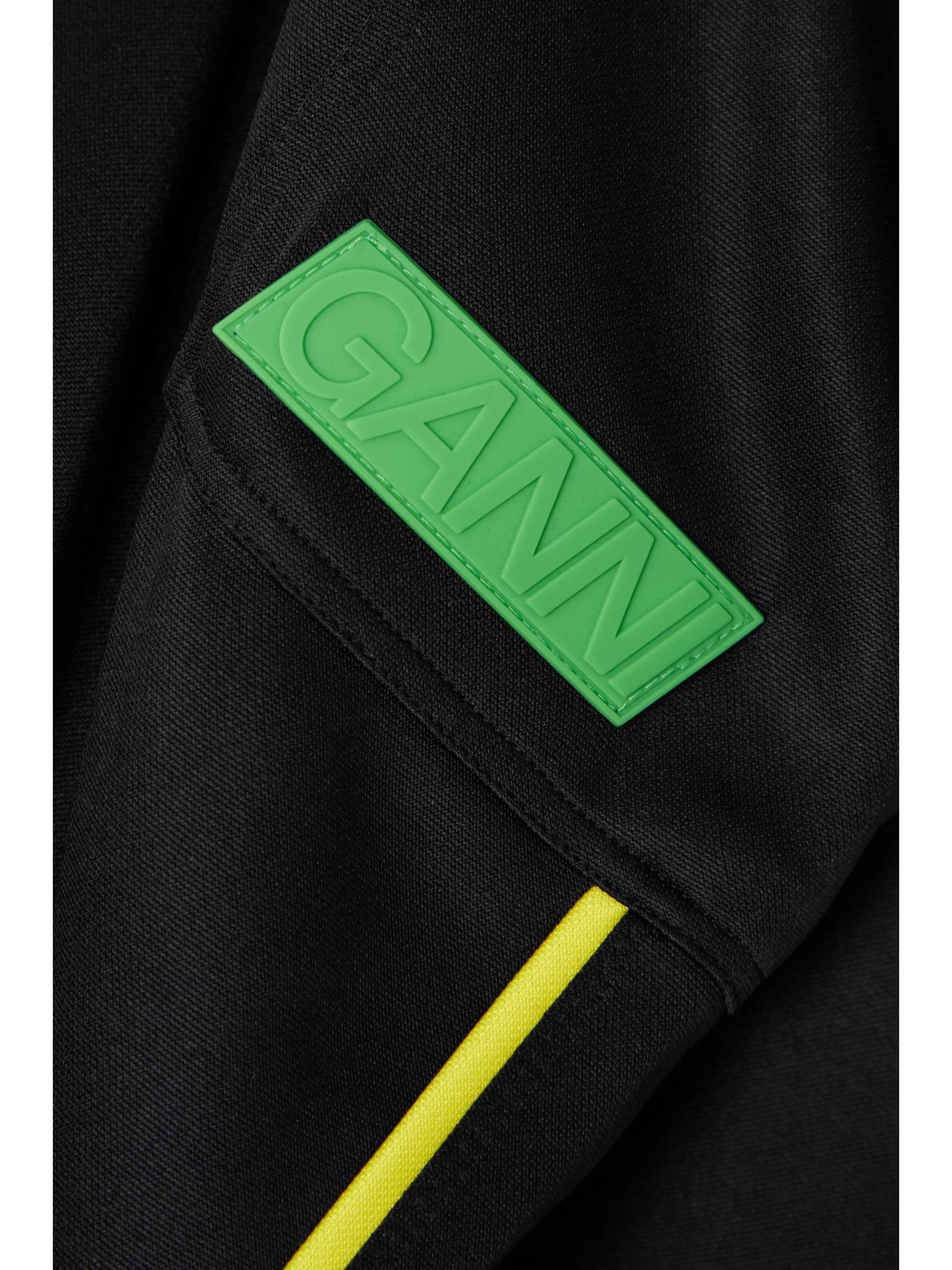 GANNI Appliquéd recycled-jersey tapered track pants