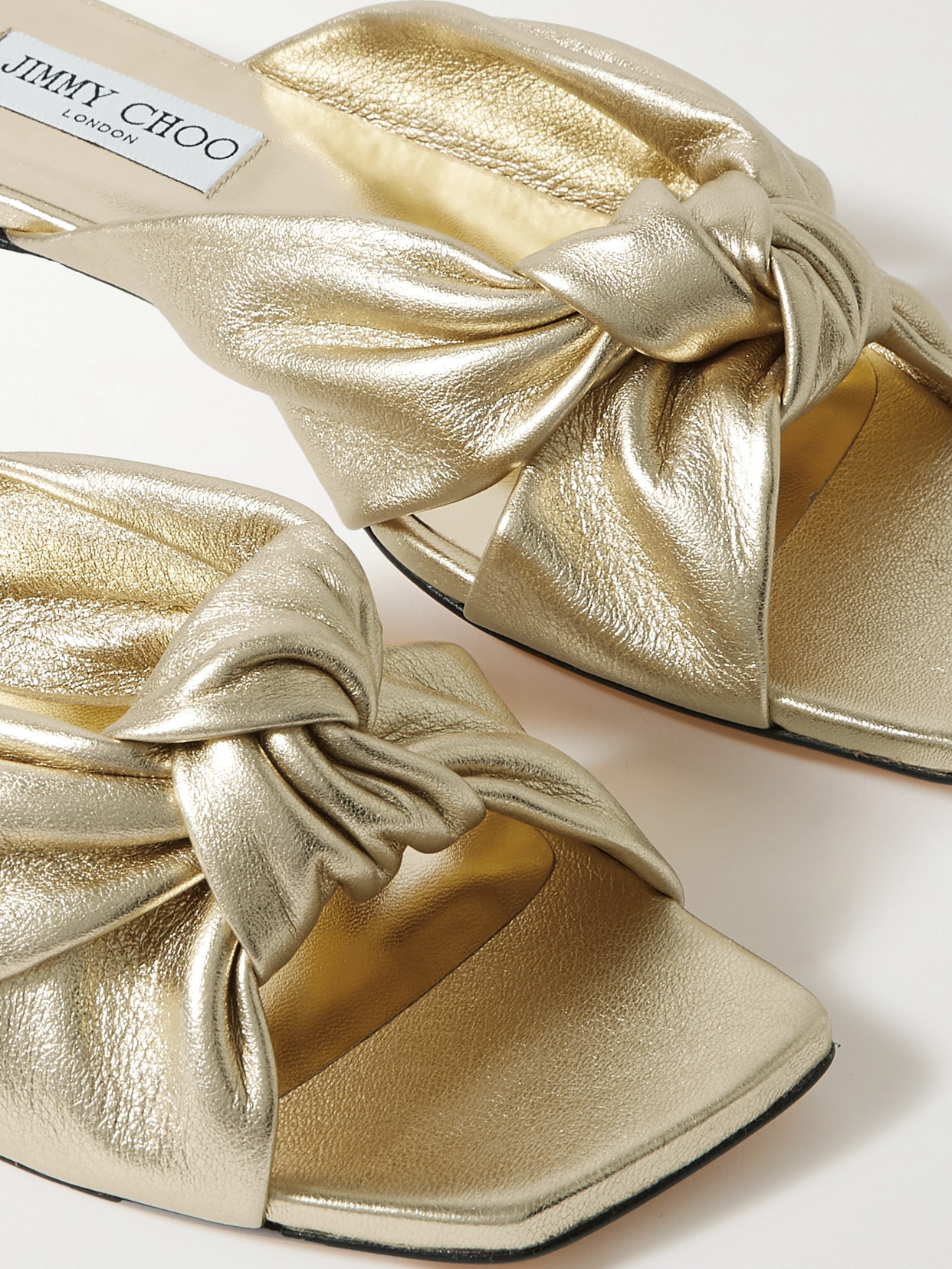 Shop Jimmy Choo Avenue Knotted Metallic Leather Sandals In Gold