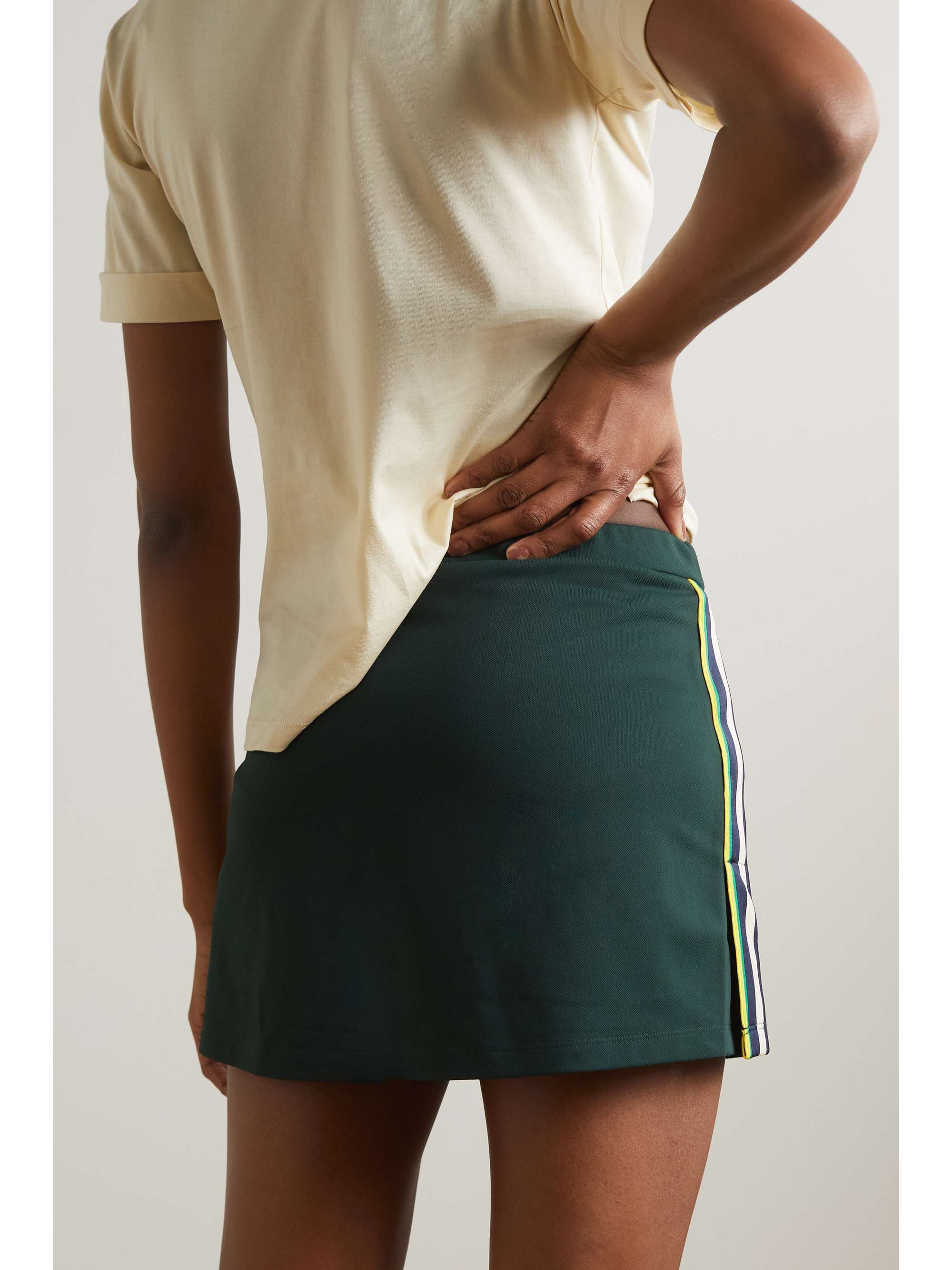 TORY SPORT Striped webbing-trimmed piqué tennis skirt