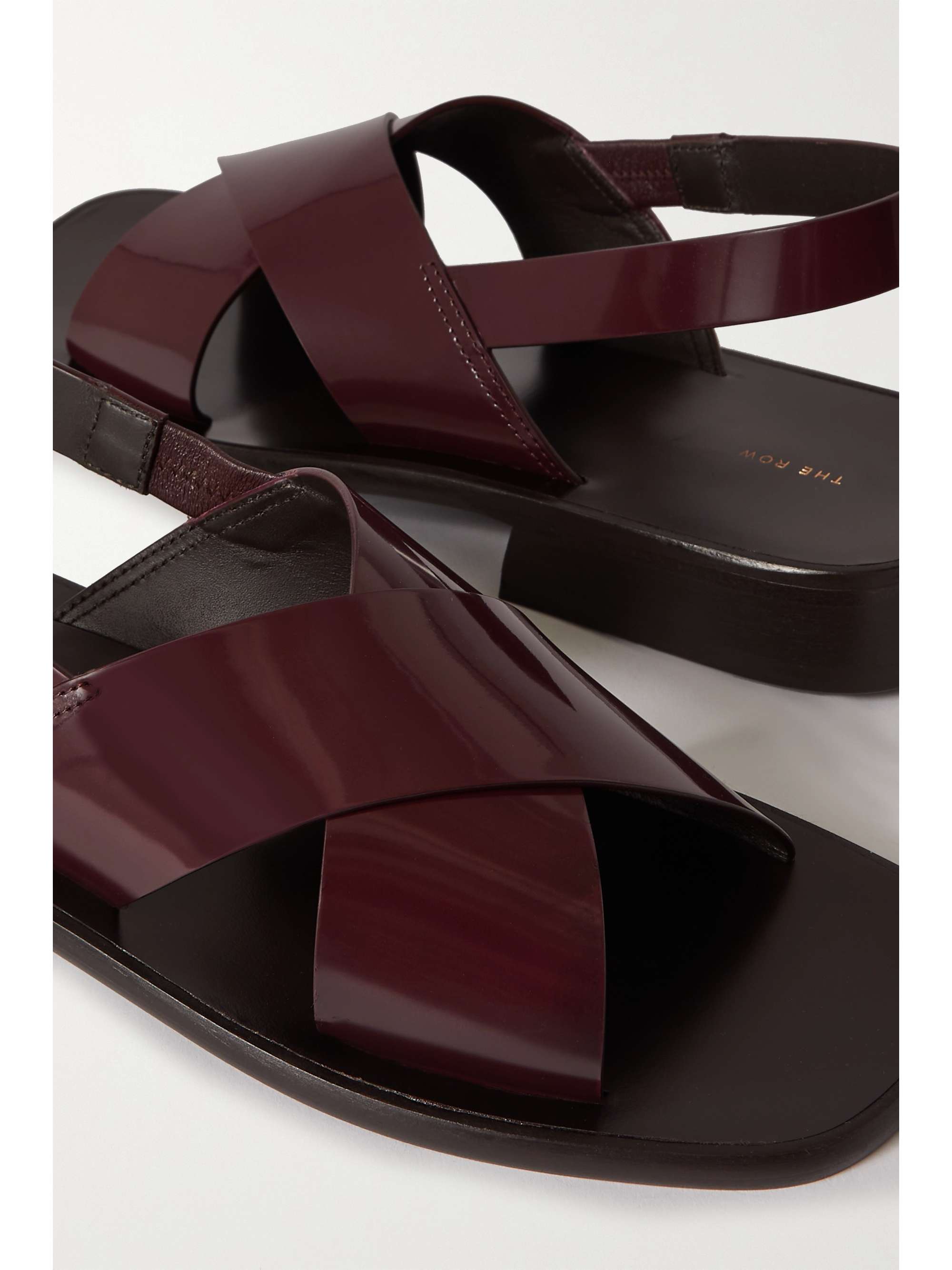 THE ROW Mensy glossed-leather slingback sandals
