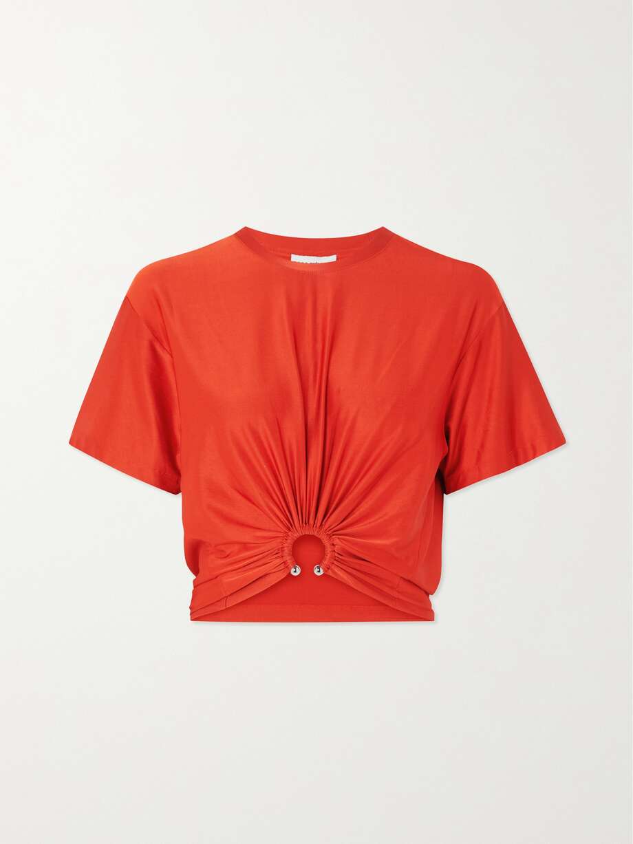 Paco Rabanne uses metallic hardware to elevate the basics, too. This T-shirt is made from glossy jersey fitted with a silver barbell to create ruching through the body. Temper its close fit with wide-leg pants or jeans.