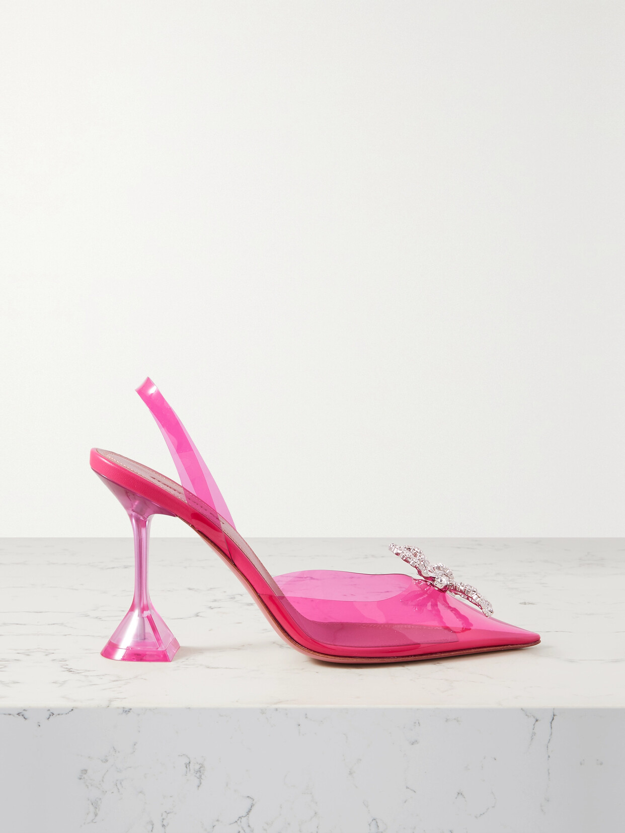 Shop Amina Muaddi Rosie Crystal-embellished Bow-detailed Pvc Slingback Pumps In Pink