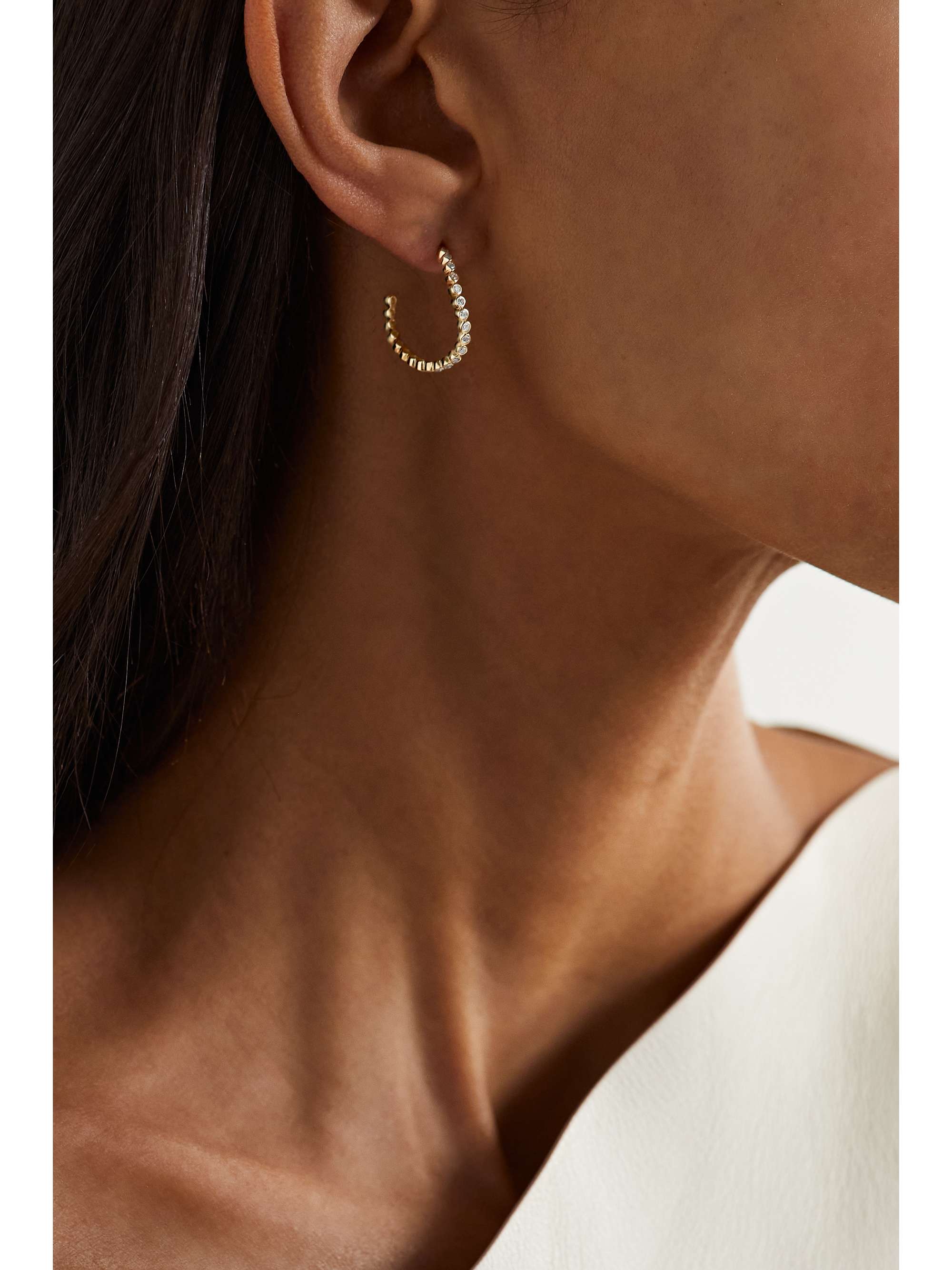 Wave 14 karat gold diamond hoop earrings