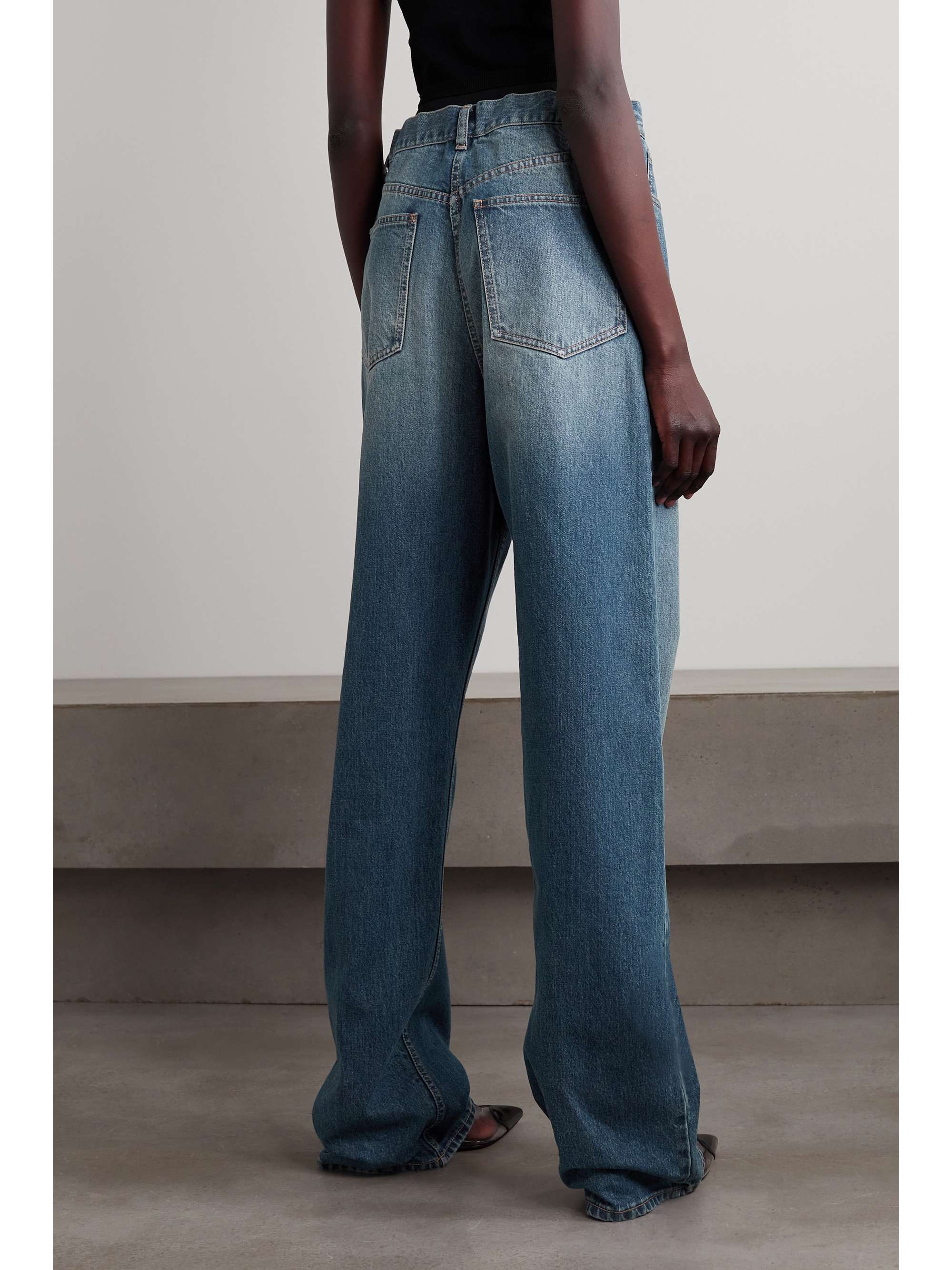 ALAÏA Archetypes ribbed paneled stretch-knit wide-leg jeans