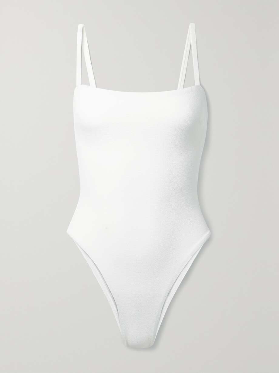 The clean lines and minimalist design of Matteau's 'Petite Square' swimsuit have made it one of the label's best-selling styles. Cut from seersucker blended with 80% recycled fibers, it has slim straps and medium-coverage briefs with elongating, high-cut legs. You can also wear it as a bodysuit.
