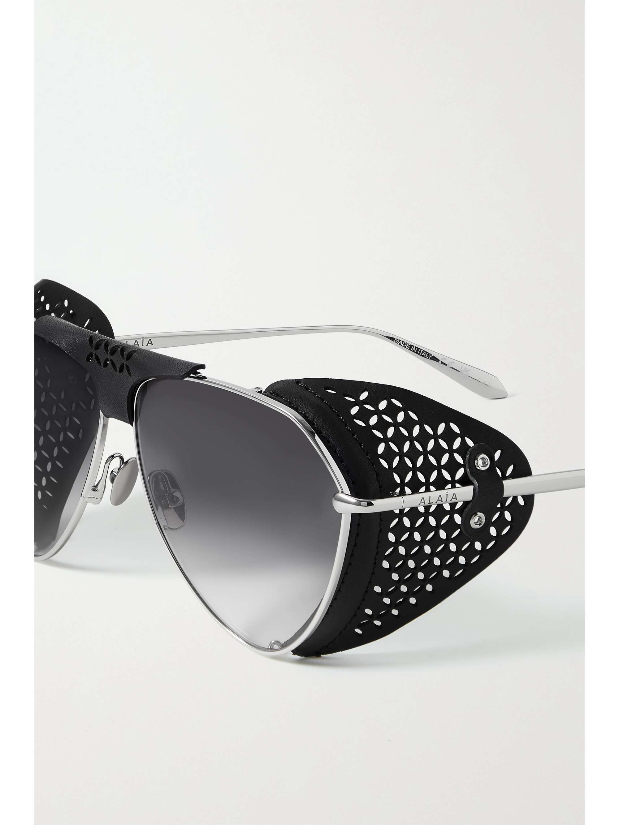 ALAÏA EYEWEAR Aviator-style laser-cut leather and silver-tone sunglasses