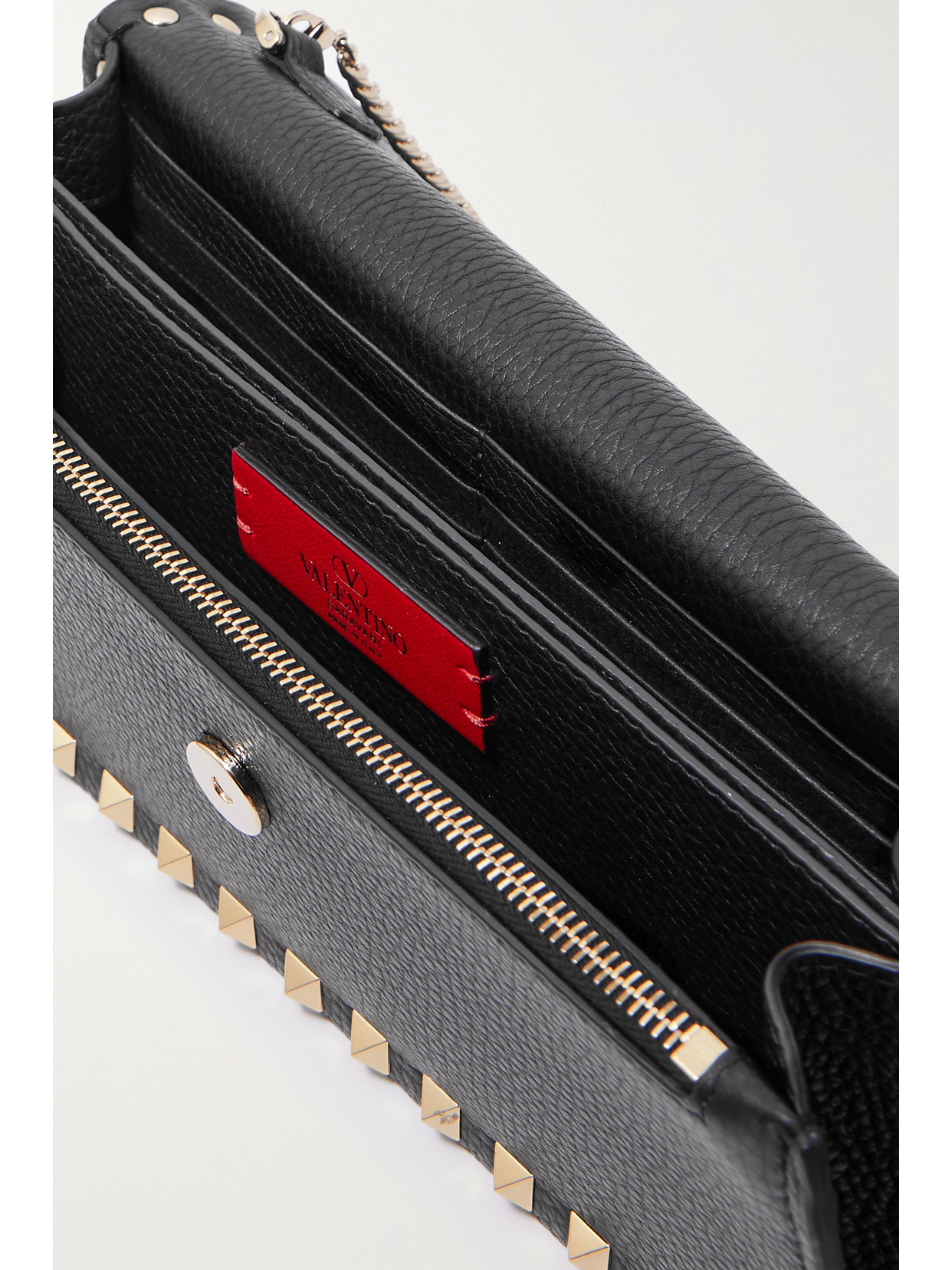 Shop Valentino Rockstud Textured-leather Clutch In Black