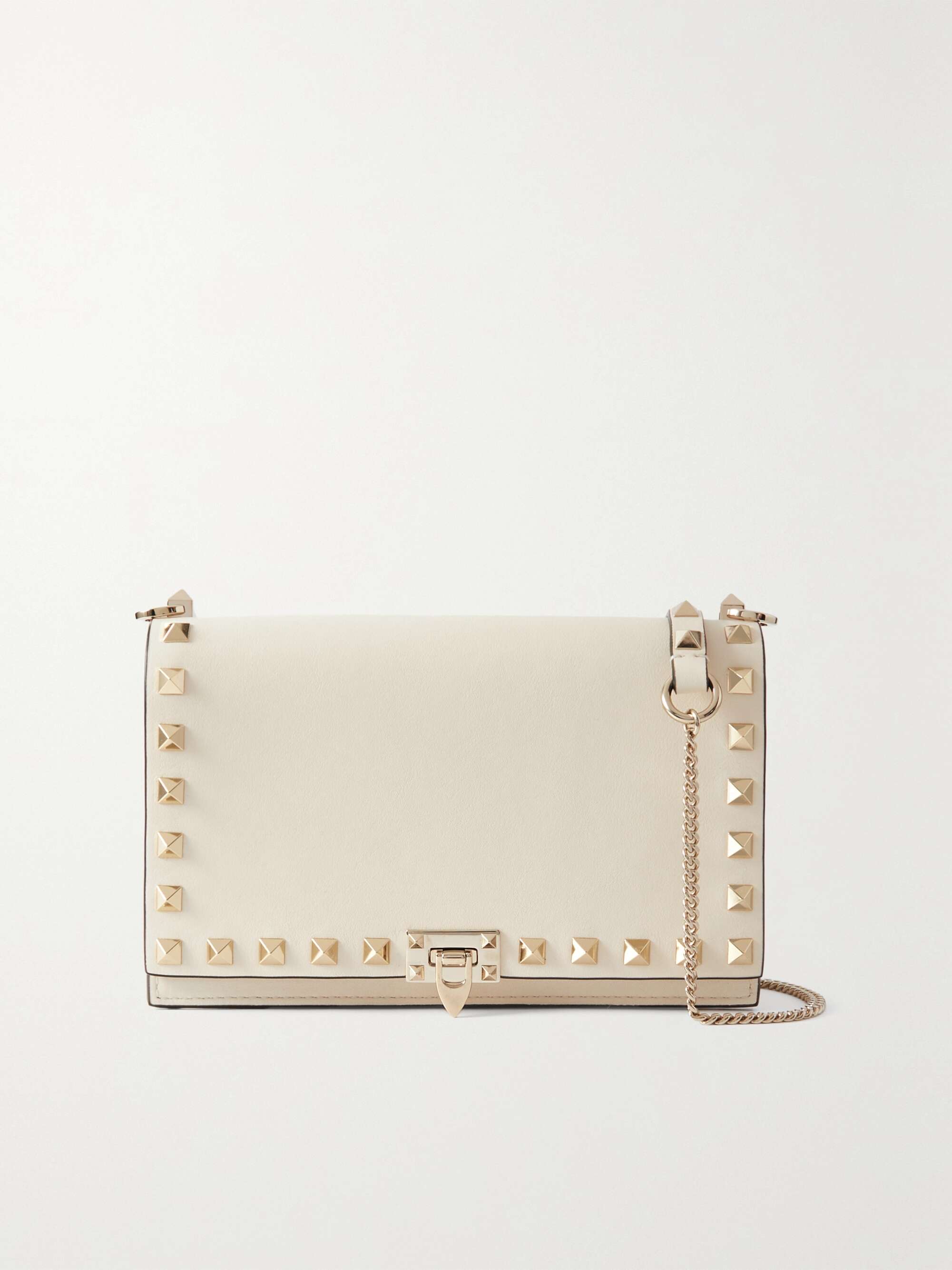 Rockstud-embellished leather clutch bag, Valentino Garavani