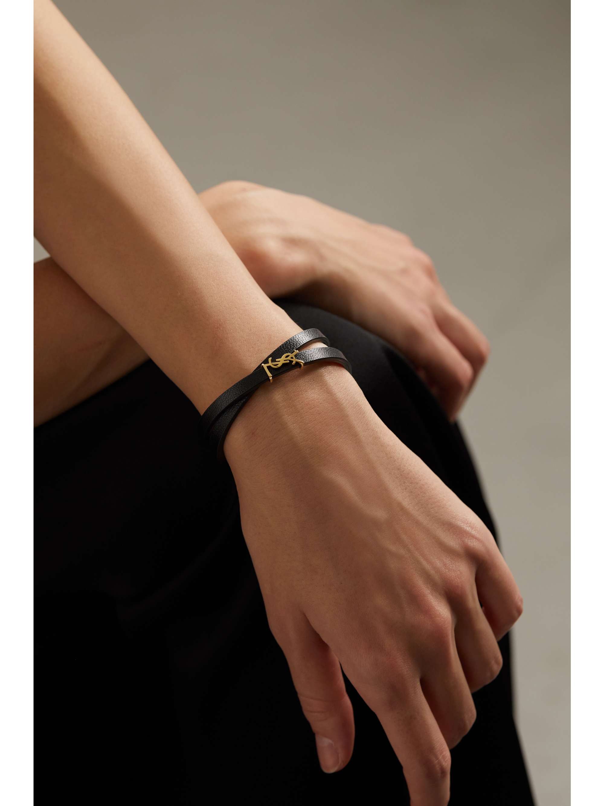 SAINT LAURENT Opyum leather and gold-tone bracelet