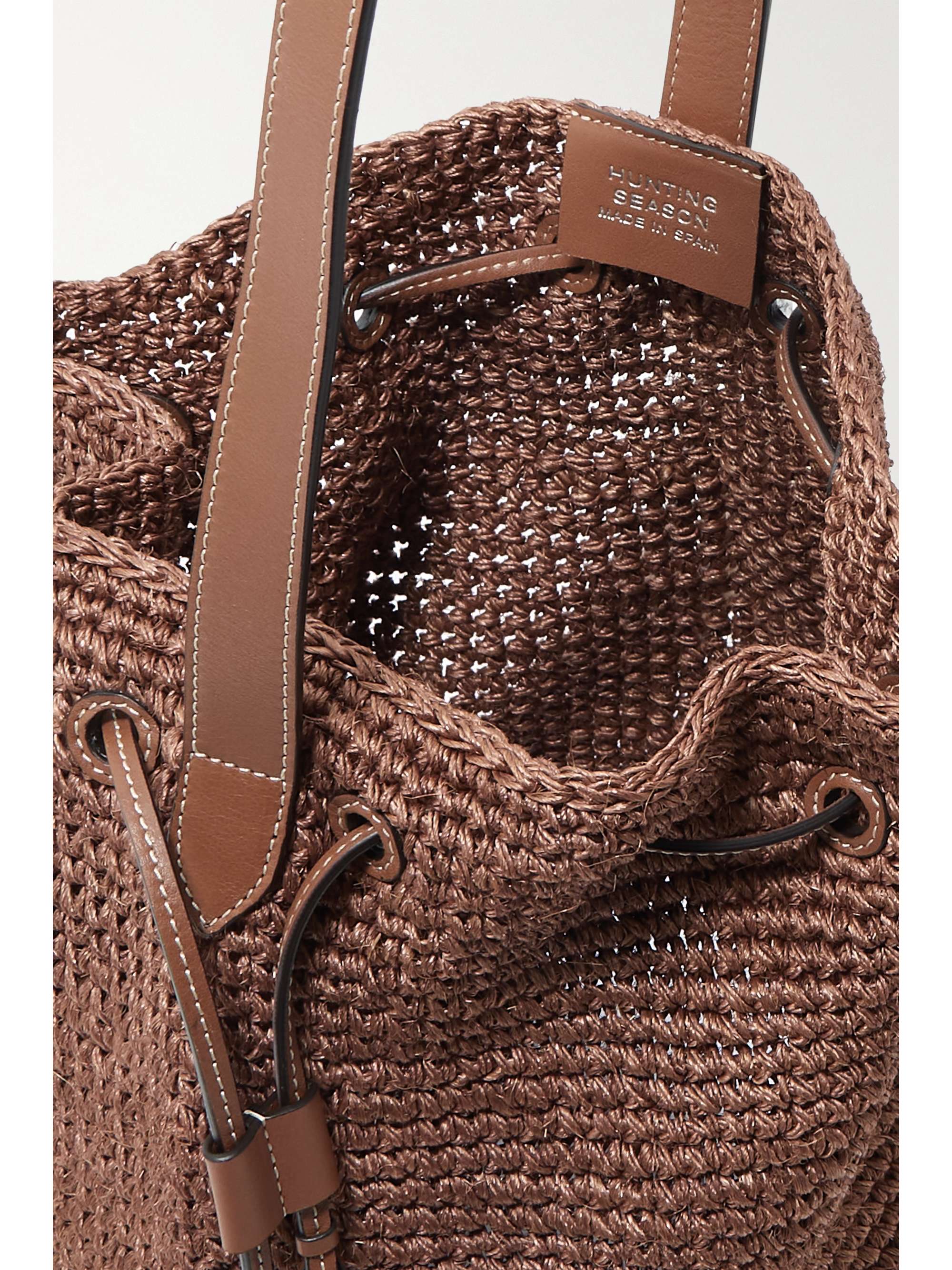 HUNTING SEASON Leathertrimmed raffia bucket bag NETAPORTER