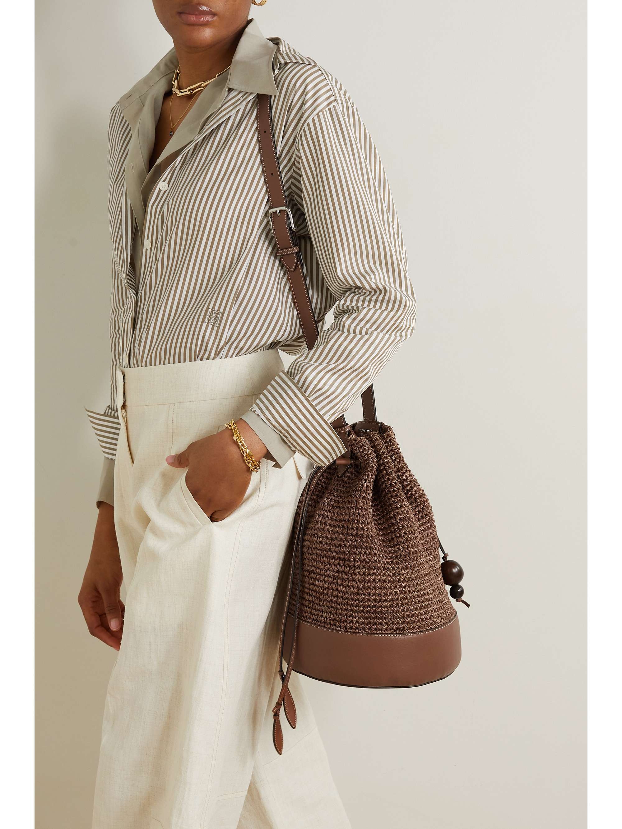 HUNTING SEASON Leathertrimmed raffia bucket bag NETAPORTER