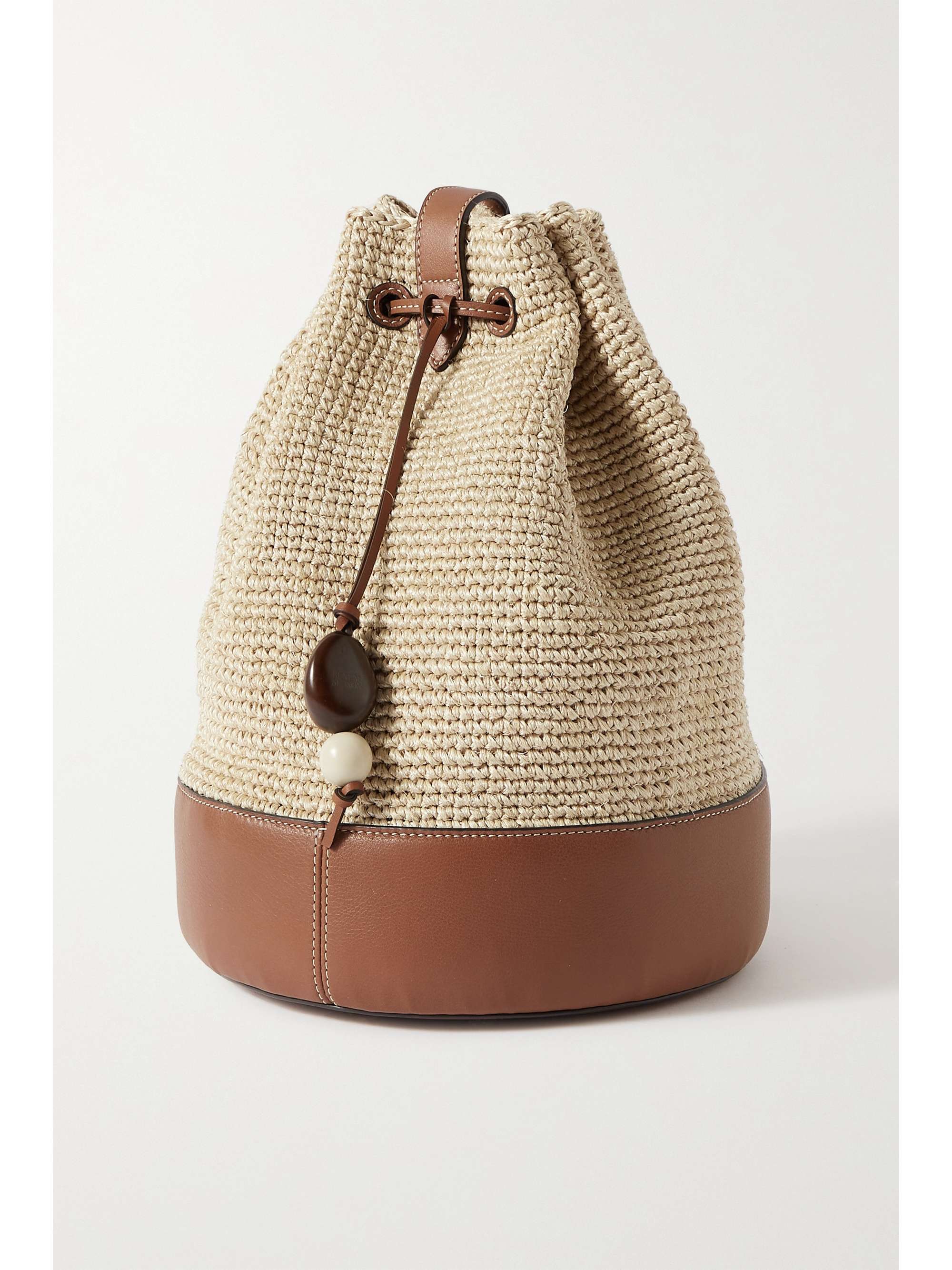 HUNTING SEASON Leathertrimmed raffia bucket bag NETAPORTER