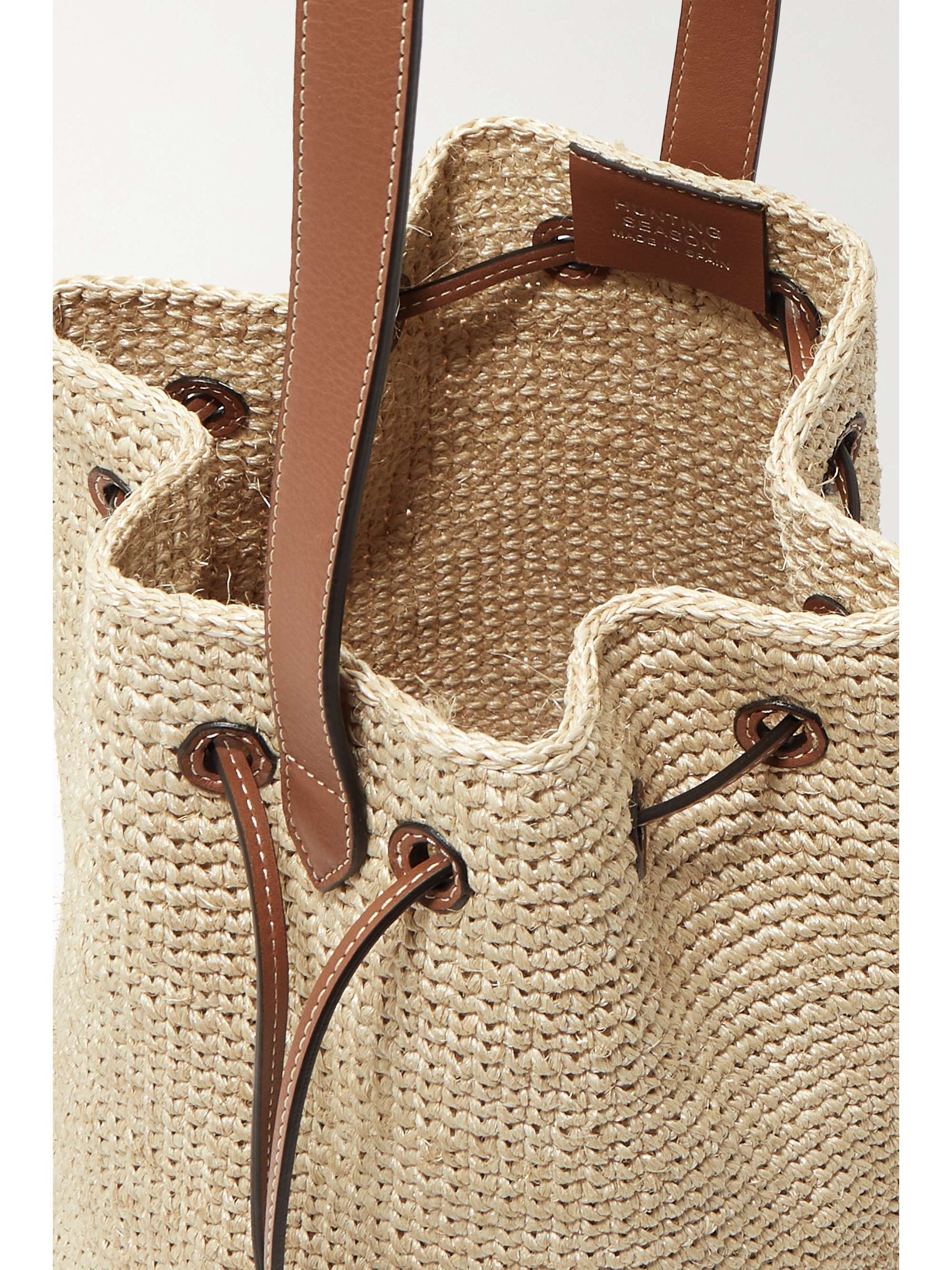 HUNTING SEASON Leathertrimmed raffia bucket bag NETAPORTER