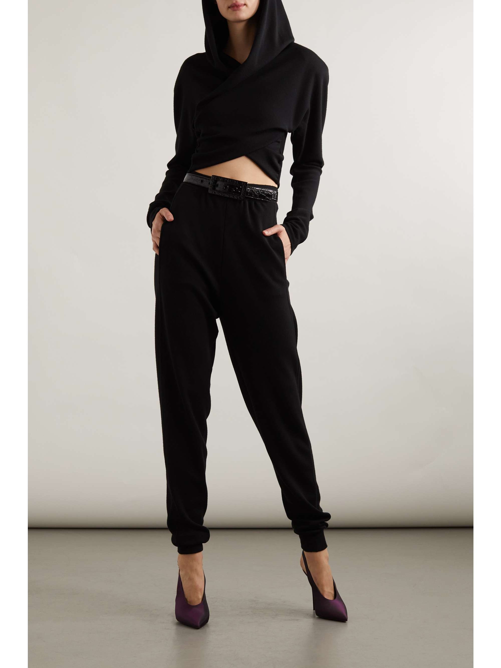 High-rise flared wool pants in black - Saint Laurent