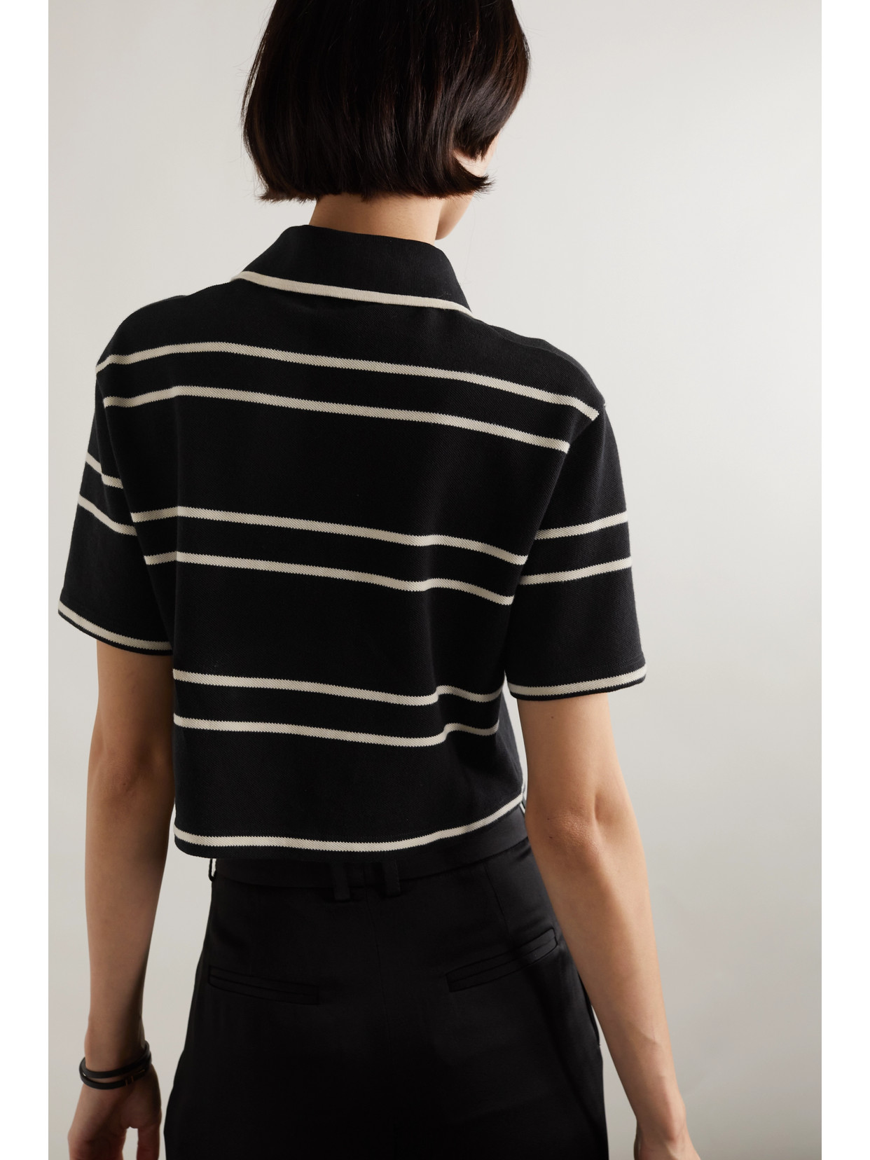 Shop Saint Laurent Striped Cropped Cotton-piqué Polo Shirt In Black