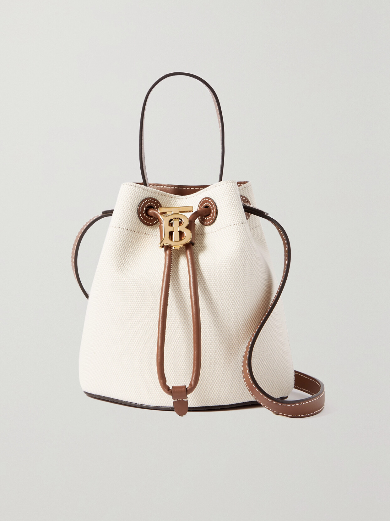 Burberry Mini Embellished Leather-trimmed Cotton-canvas Bucket Bag In Neutrals