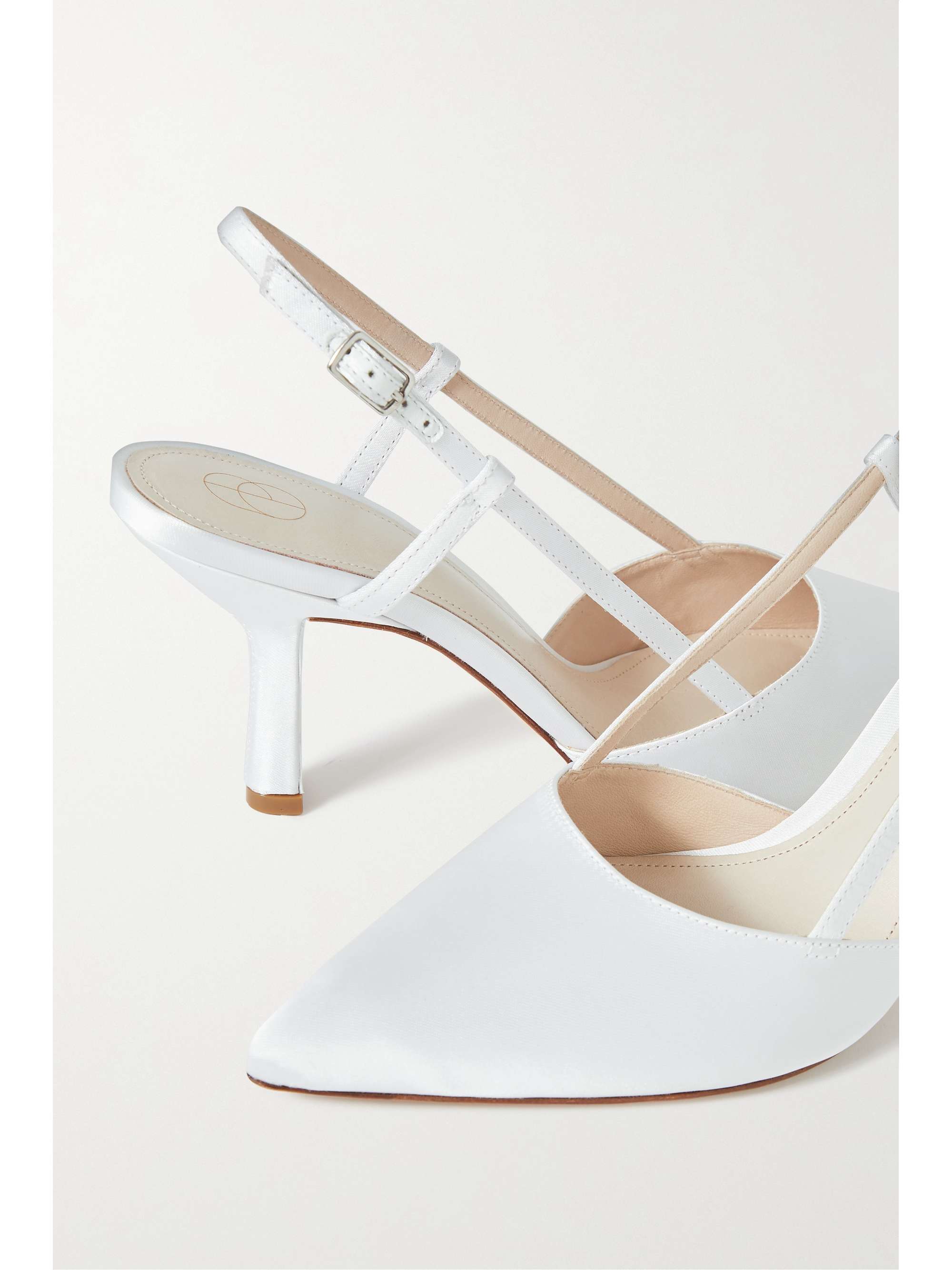 White clearance slingback pumps
