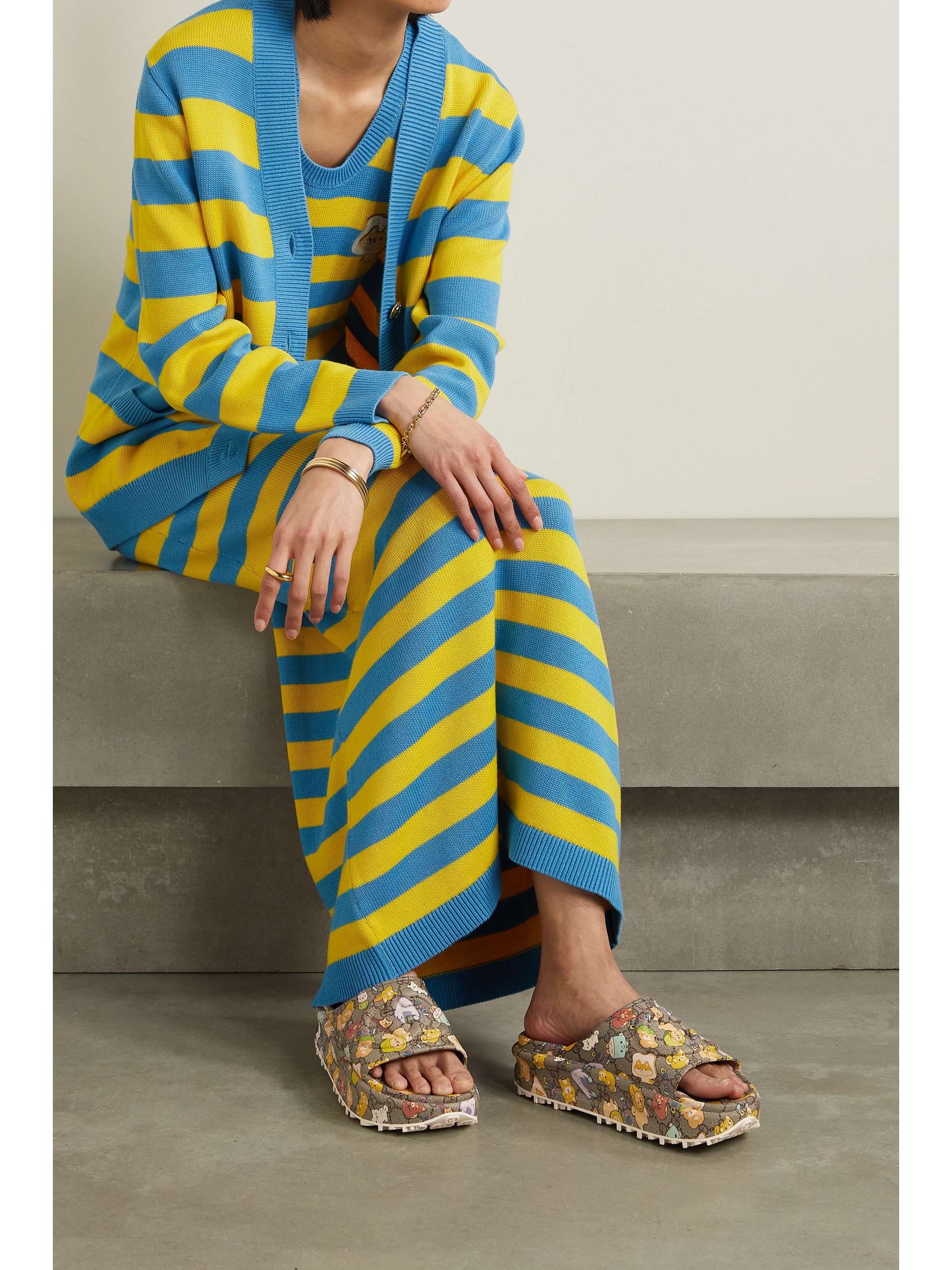 GUCCI + Angela Nguyen embossed printed rubber platform slides