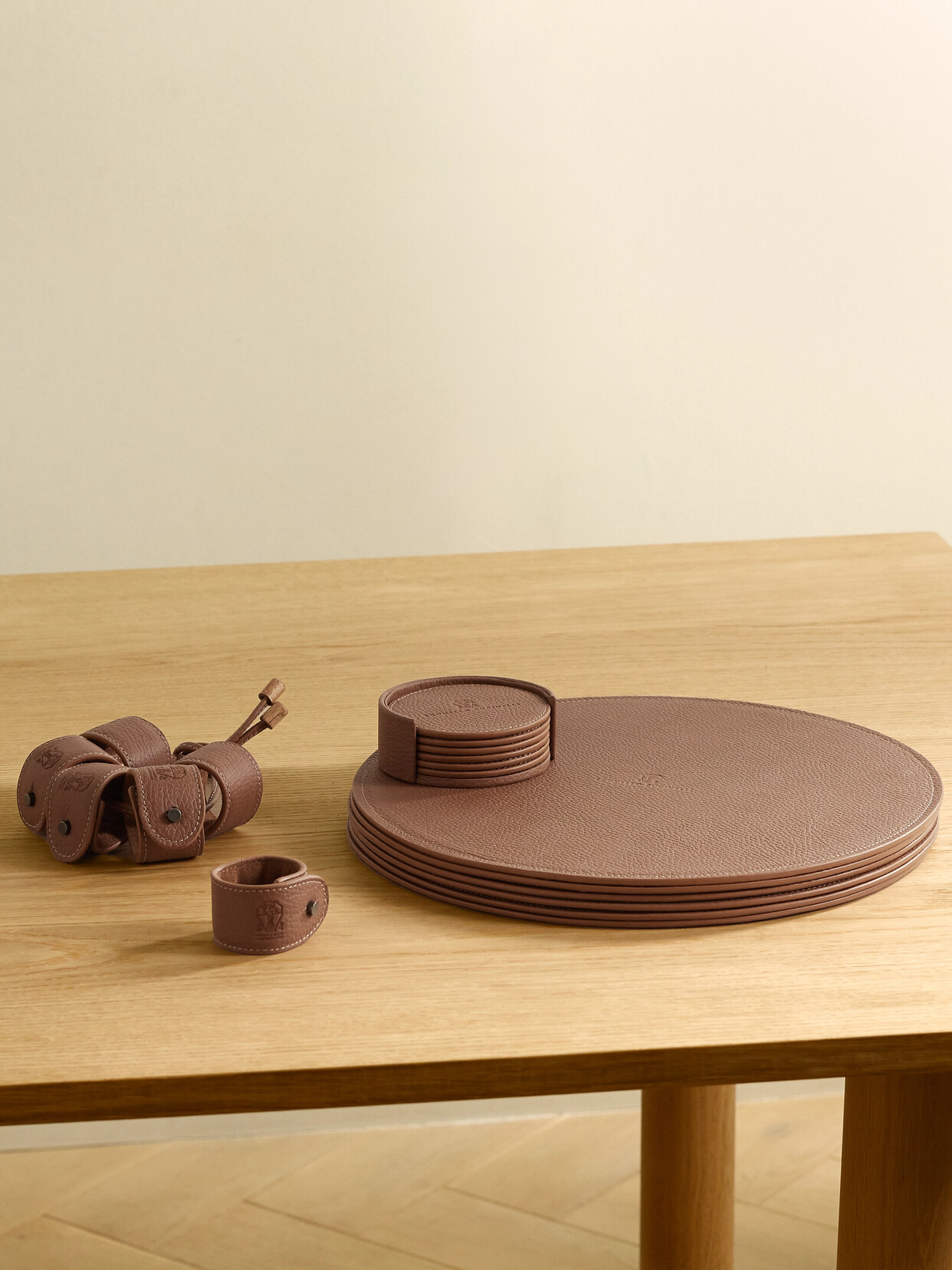 Brunello Cucinelli Set Of Six Debossed Leather Placemats, Coasters And Napkin Rings In Brown