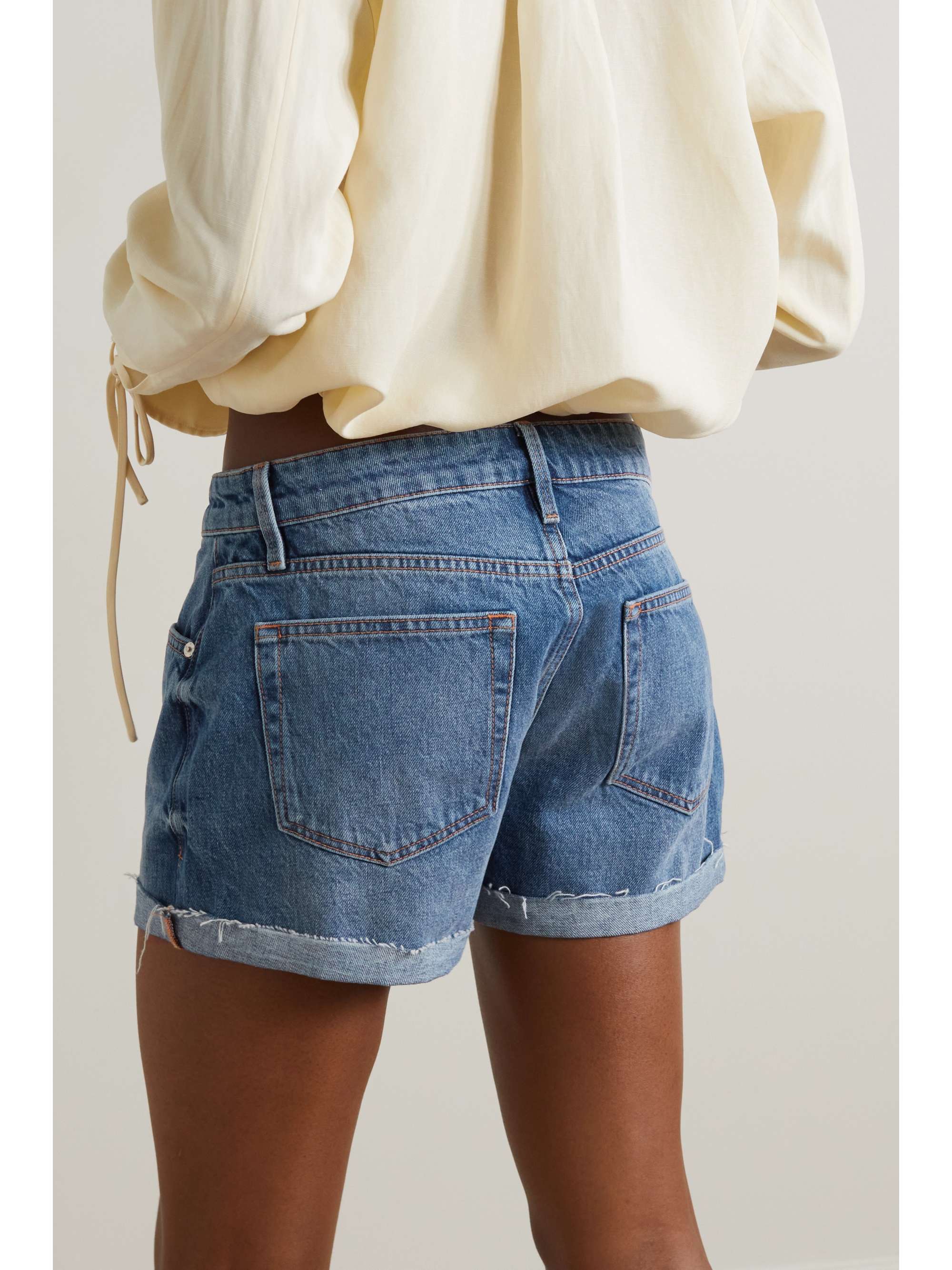 FRAME Le Grand Garcon frayed denim shorts