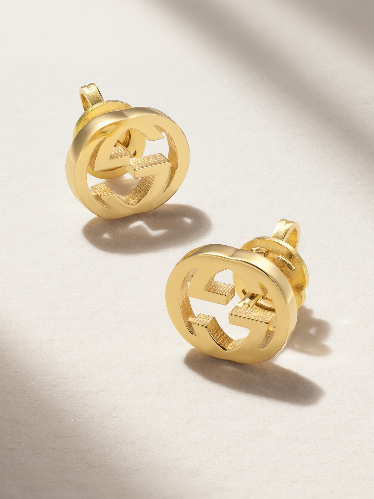 Gucci Interlocking G 18-karat Gold Earrings