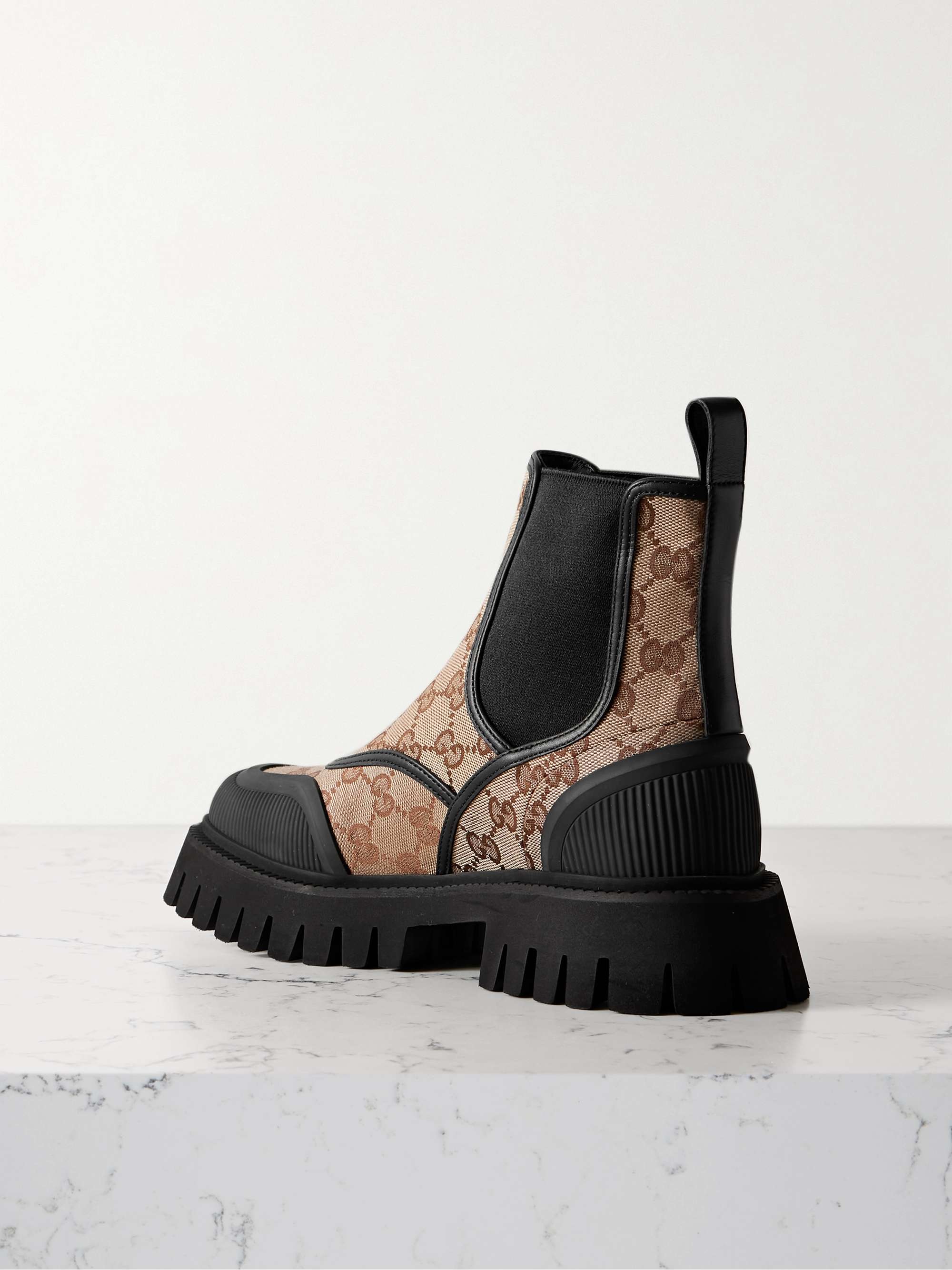 GUCCI Rubber and leathertrimmed canvasjacquard ankle boots NETAPORTER