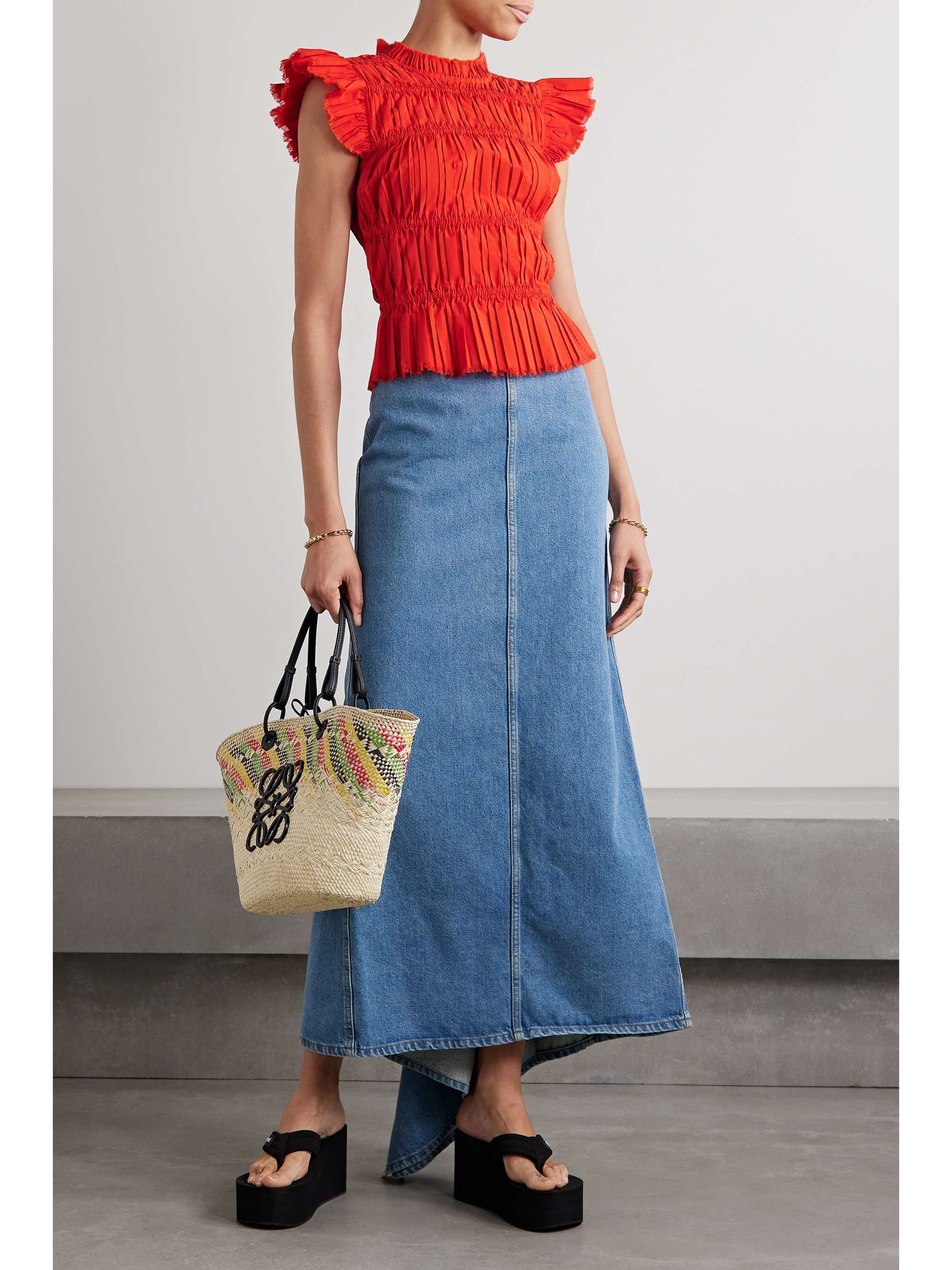 Sea's 'Greir' top is made from vibrant poplin that's gathered to create textural pleats throughout. It's designed for a slim fit with a high neckline and flutter sleeves and has gently frayed edges.