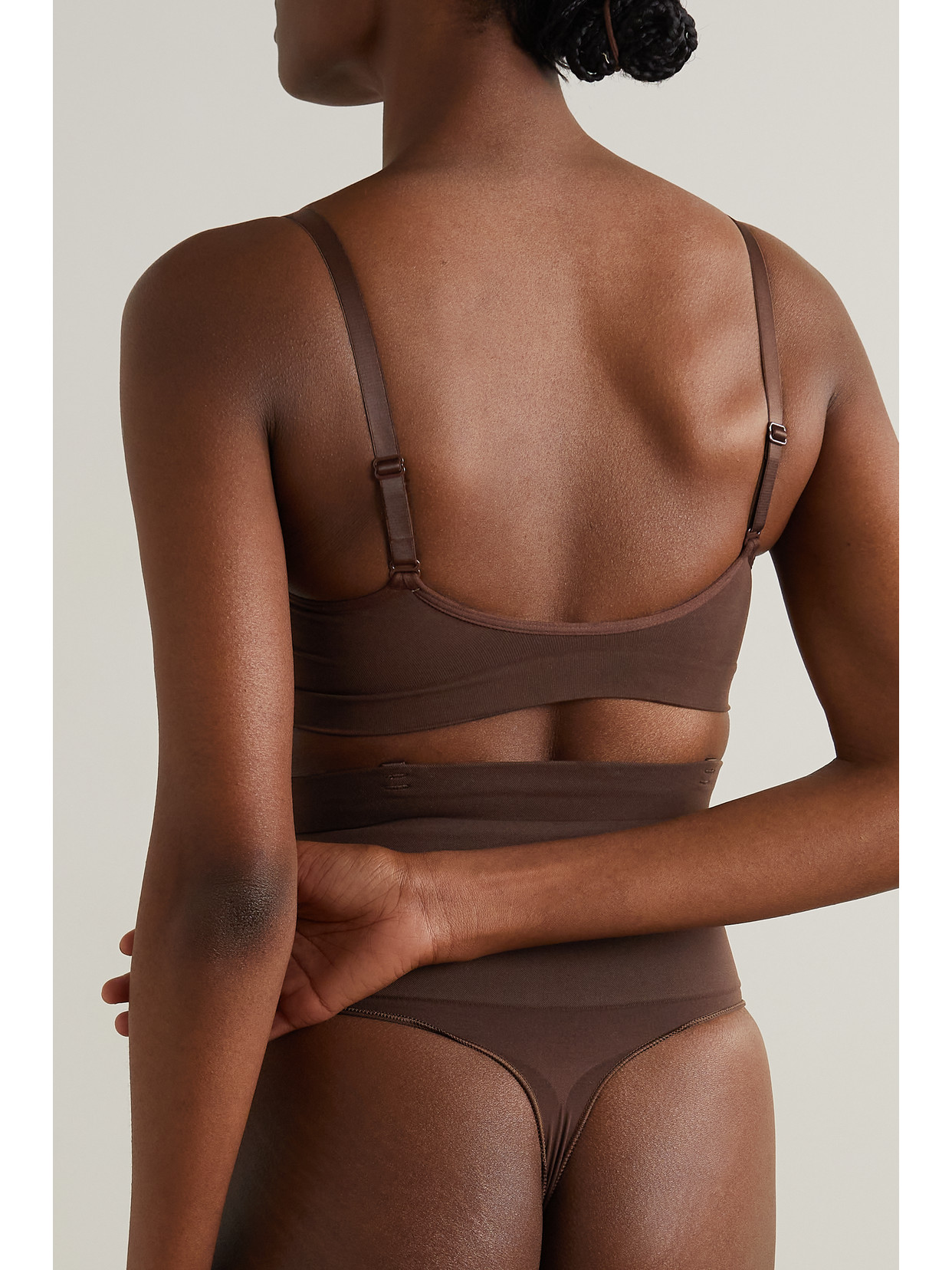 Shop Skims Seamless Sculpt Bralette In Brown