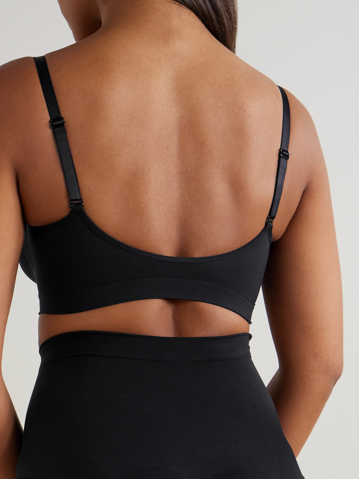 Shop Skims Seamless Sculpt Bralette In Black