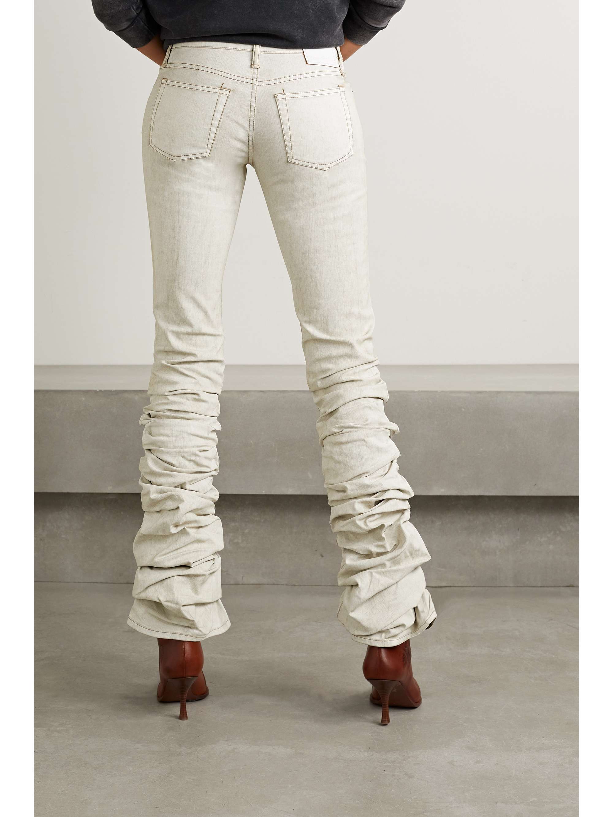 ACNE STUDIOS Ruched low-rise flared coated-denim jeans