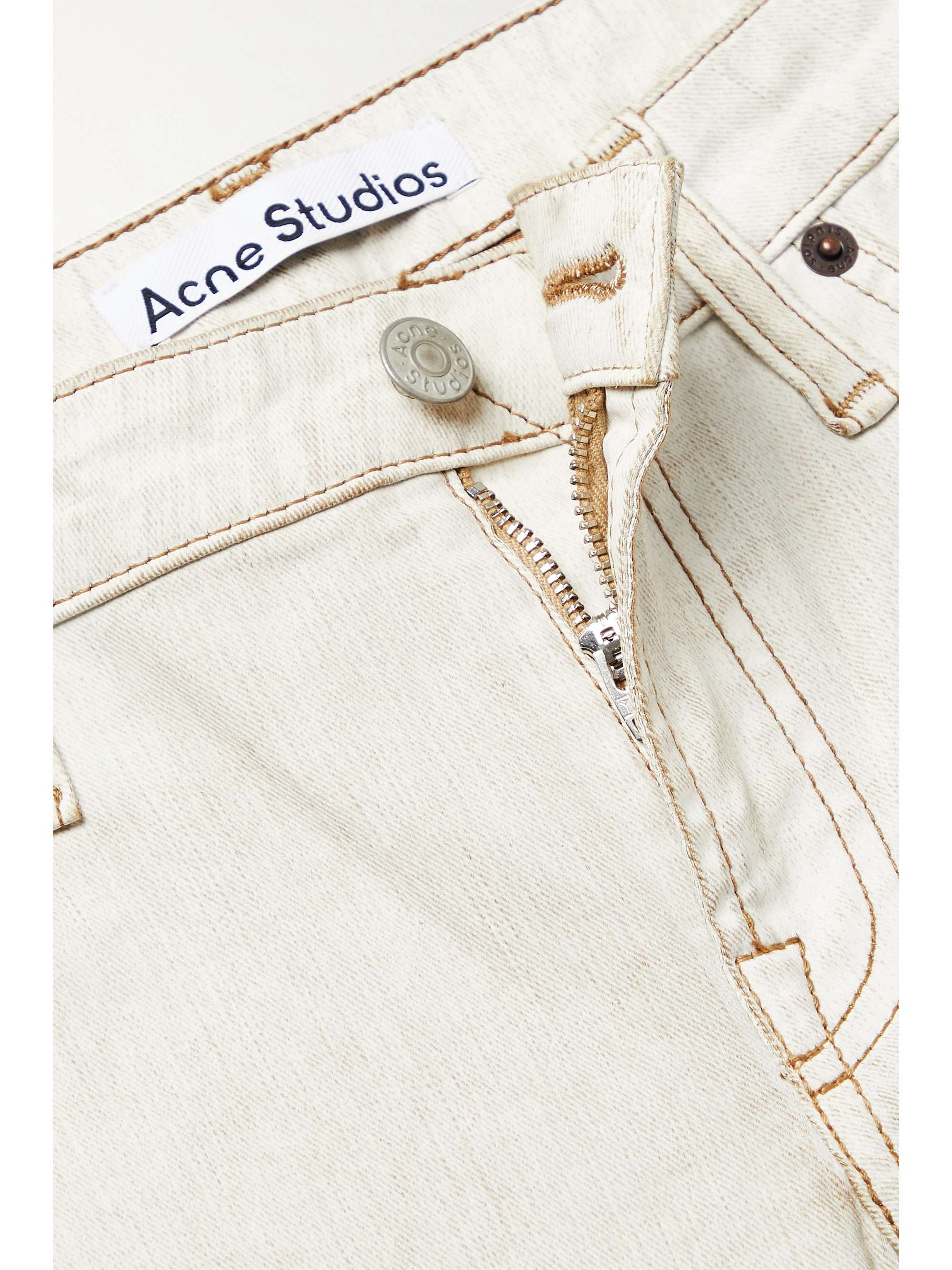 ACNE STUDIOS Ruched low-rise flared coated-denim jeans